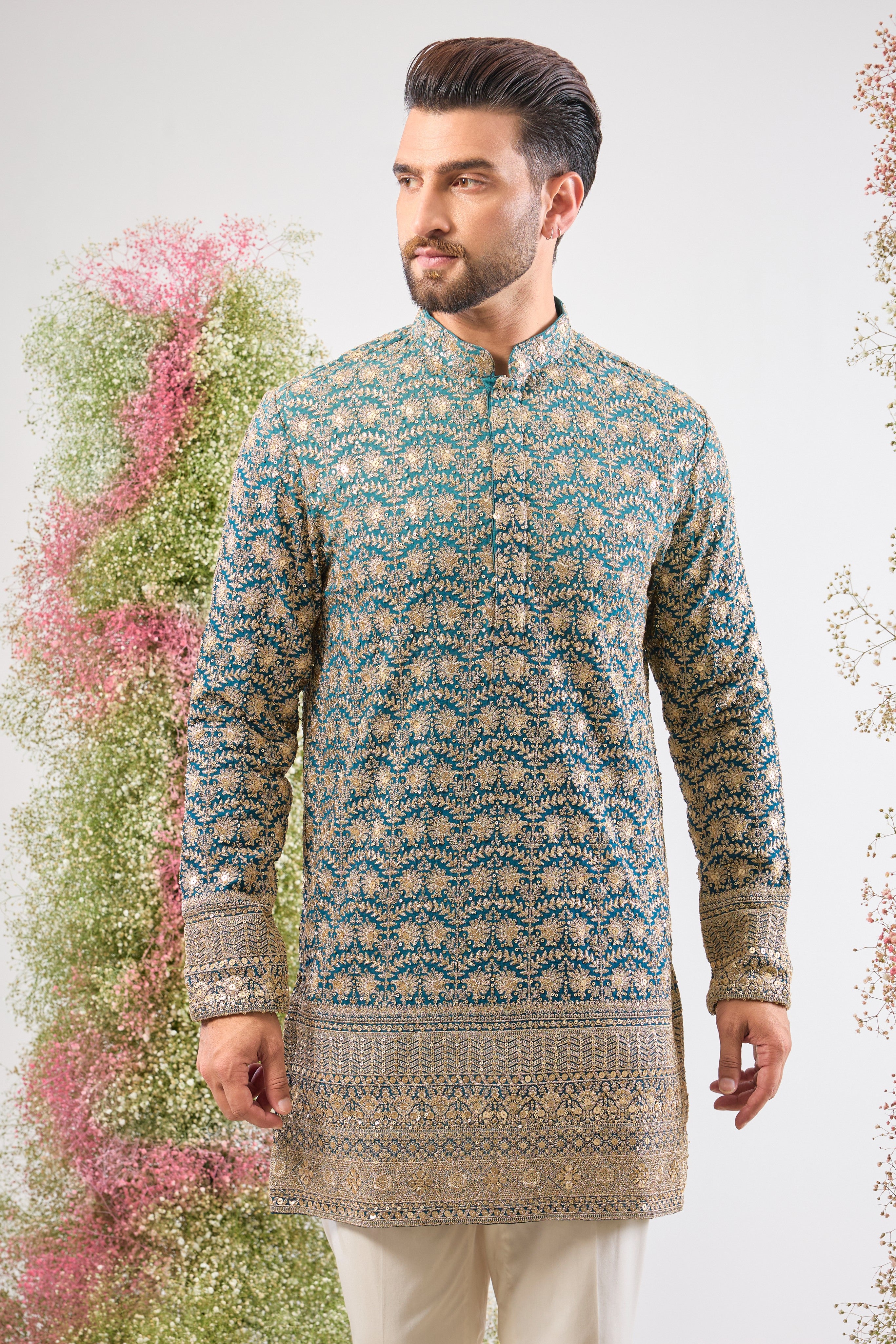 Blue Ombre brilliance. Our Short Kurta is fully adorned with Heavy Zari Work and shimmering sequin details. Bold style, short silhouette.