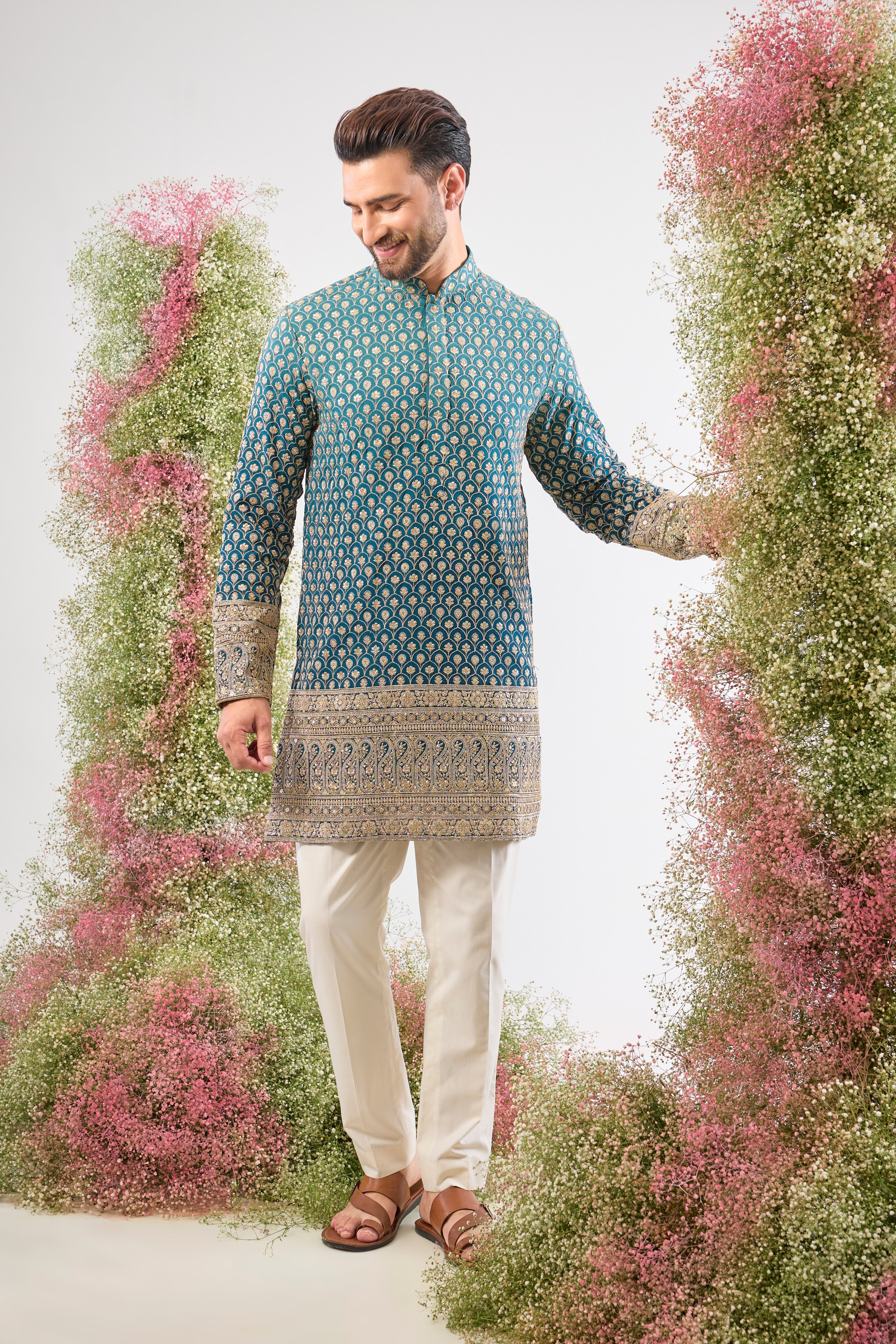 Blue Ombre brilliance. Our Short Kurta is fully adorned with Heavy Zari Work and shimmering sequin details. Bold style, short silhouette.