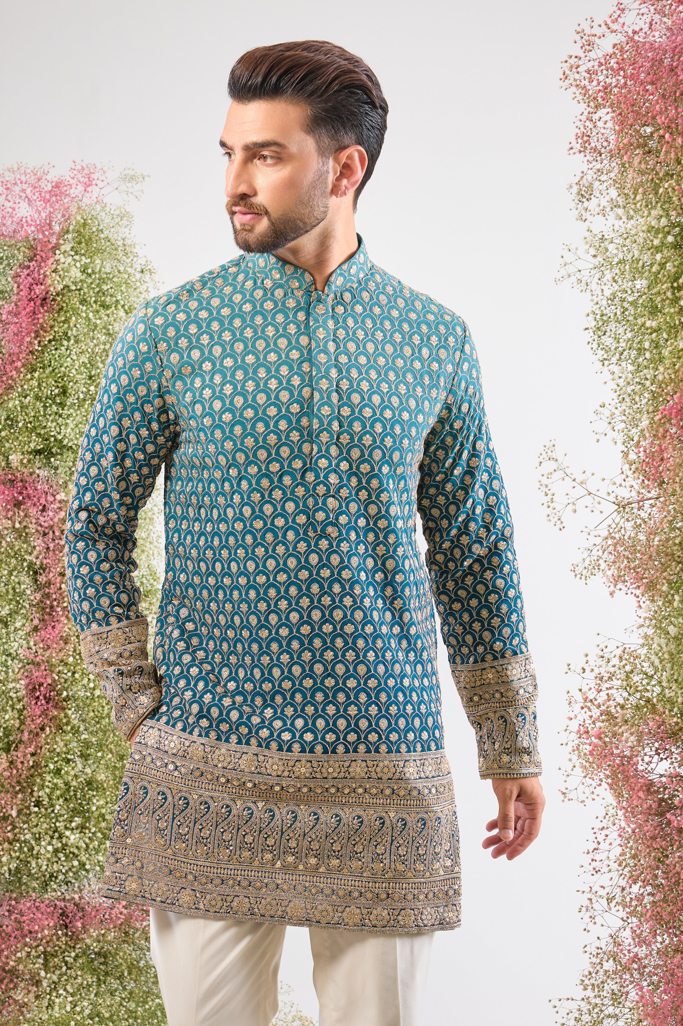 Blue Ombre brilliance. Our Short Kurta is fully adorned with Heavy Zari Work and shimmering sequin details. Bold style, short silhouette.