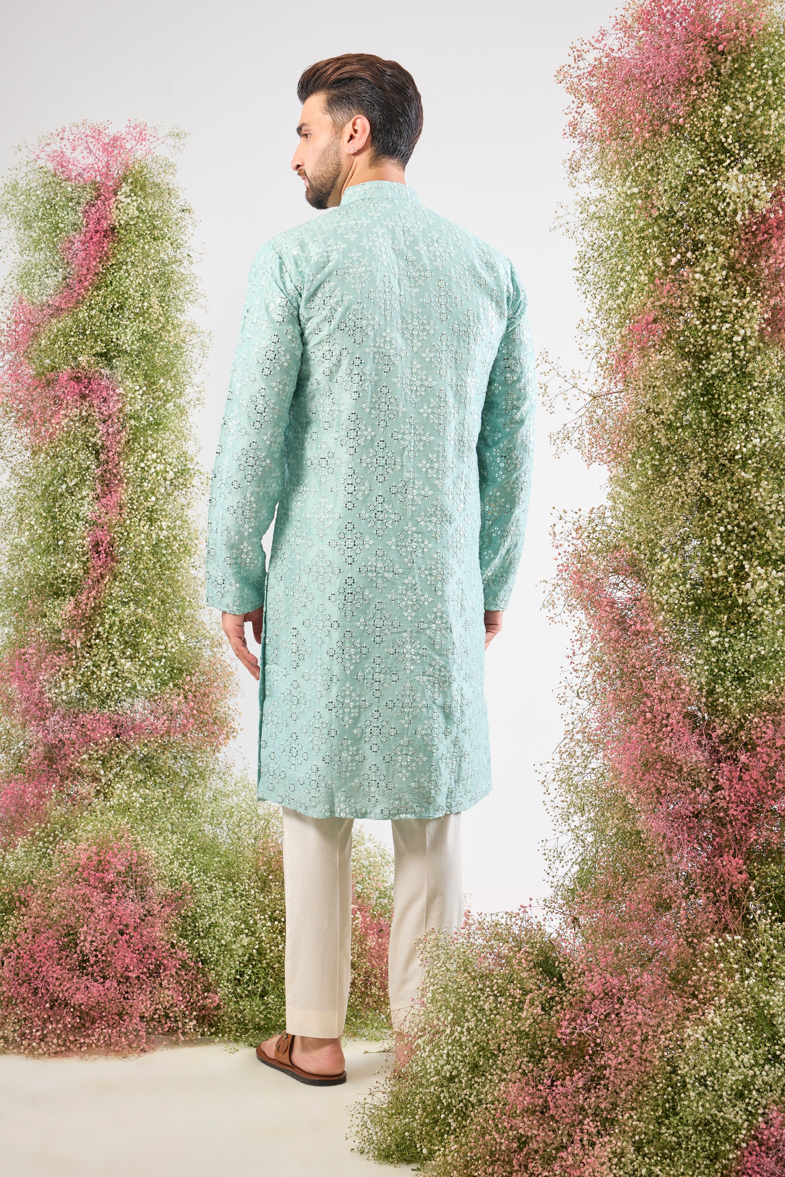 This Blue Mirror Work Long Kurta showcases dense Heavy Thread Work layered with spectacular Detailed Heavy Sequin Work, providing unmatched richness and sparkle across the long silhouette.