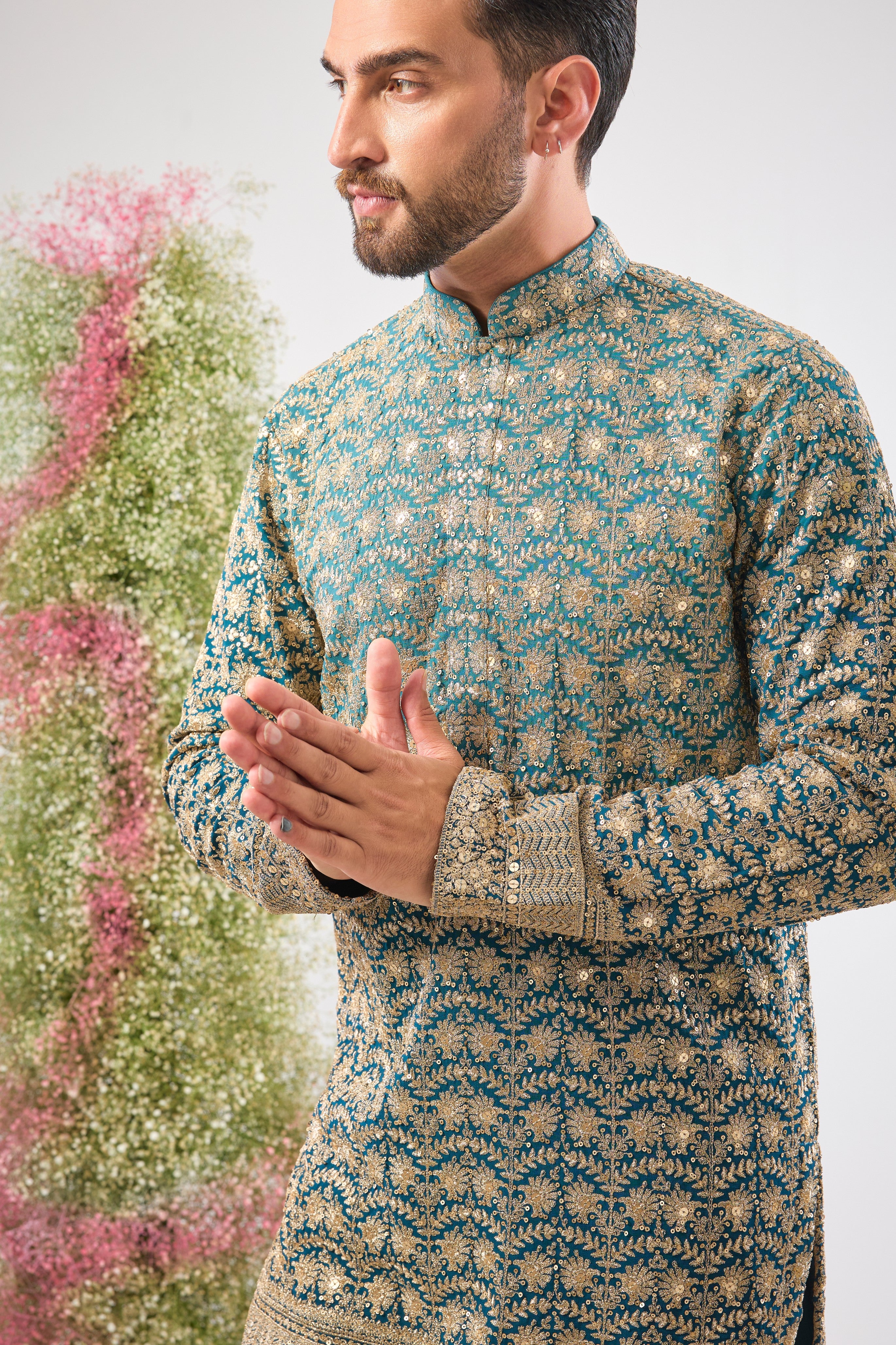 his super classy Blue Ombre Shaded Long Kurta showcases a breathtaking gradient effect and is richly adorned with Heavy Zari and Sequin Work. The fluid design and intricate shimmer make this a truly modern heirloom