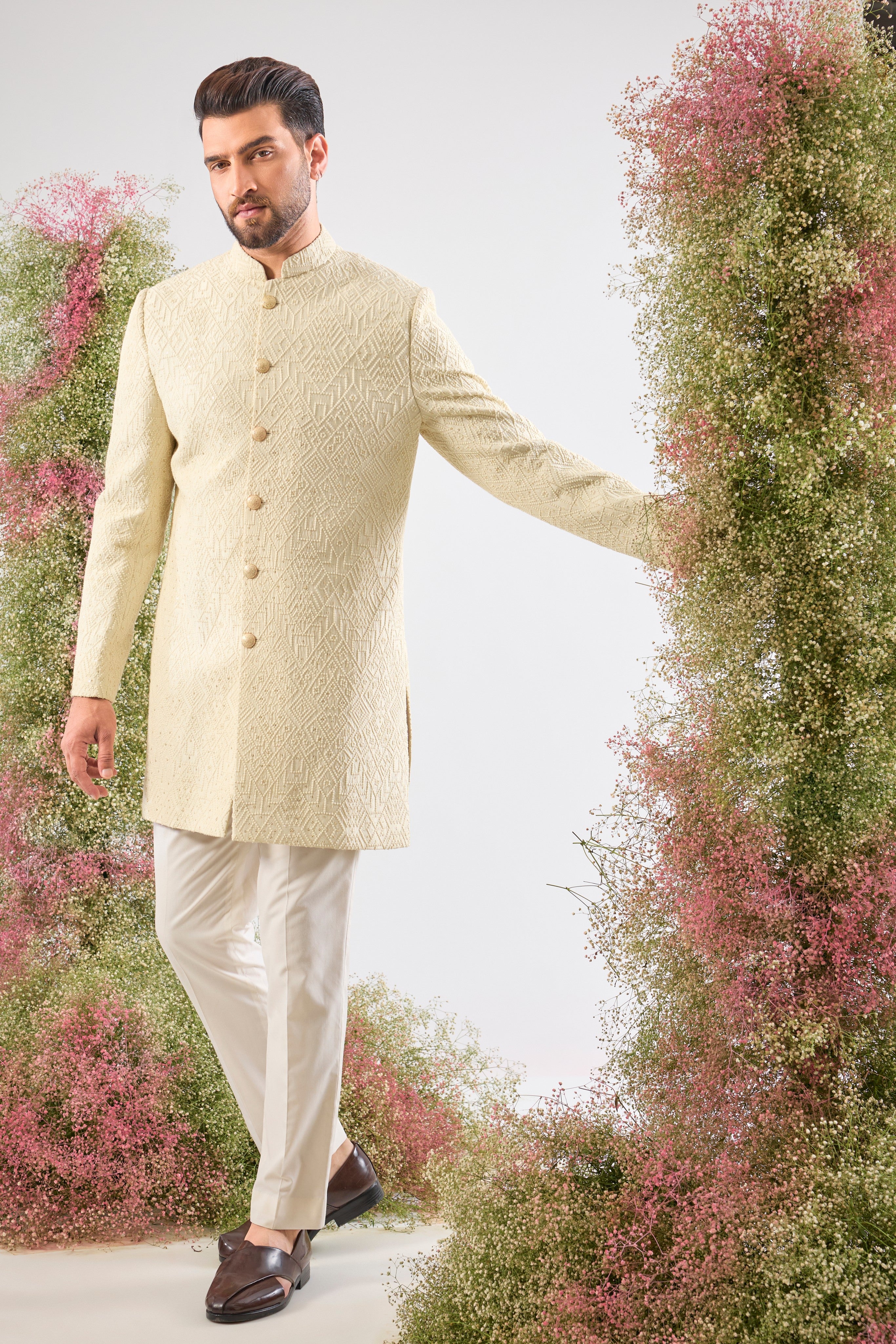 This Short Sherwani showcases intense Heavy Thread Work in a mesmerizing Geometrical Pattern, creating unparalleled texture and depth.