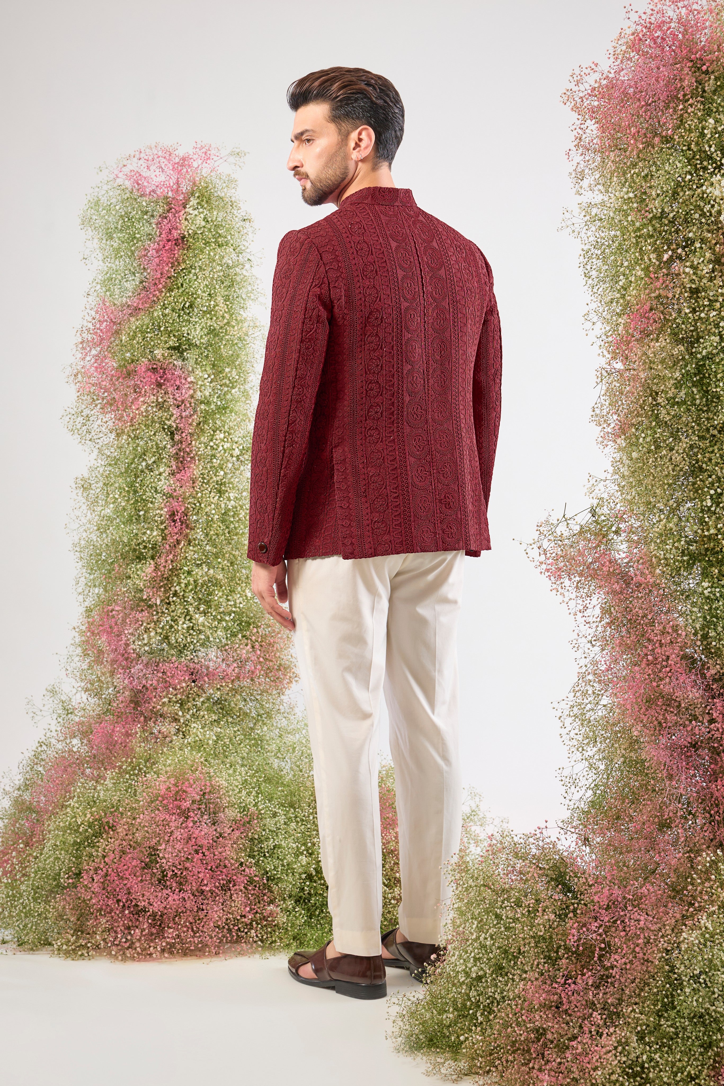 This Maroon Bandhgala is incredibly classy and subtle, showcasing spectacular Heavy Doori Work that creates luxurious, textural depth. Designed for a discerning eye, this outfit guarantees a super classy look without any bling