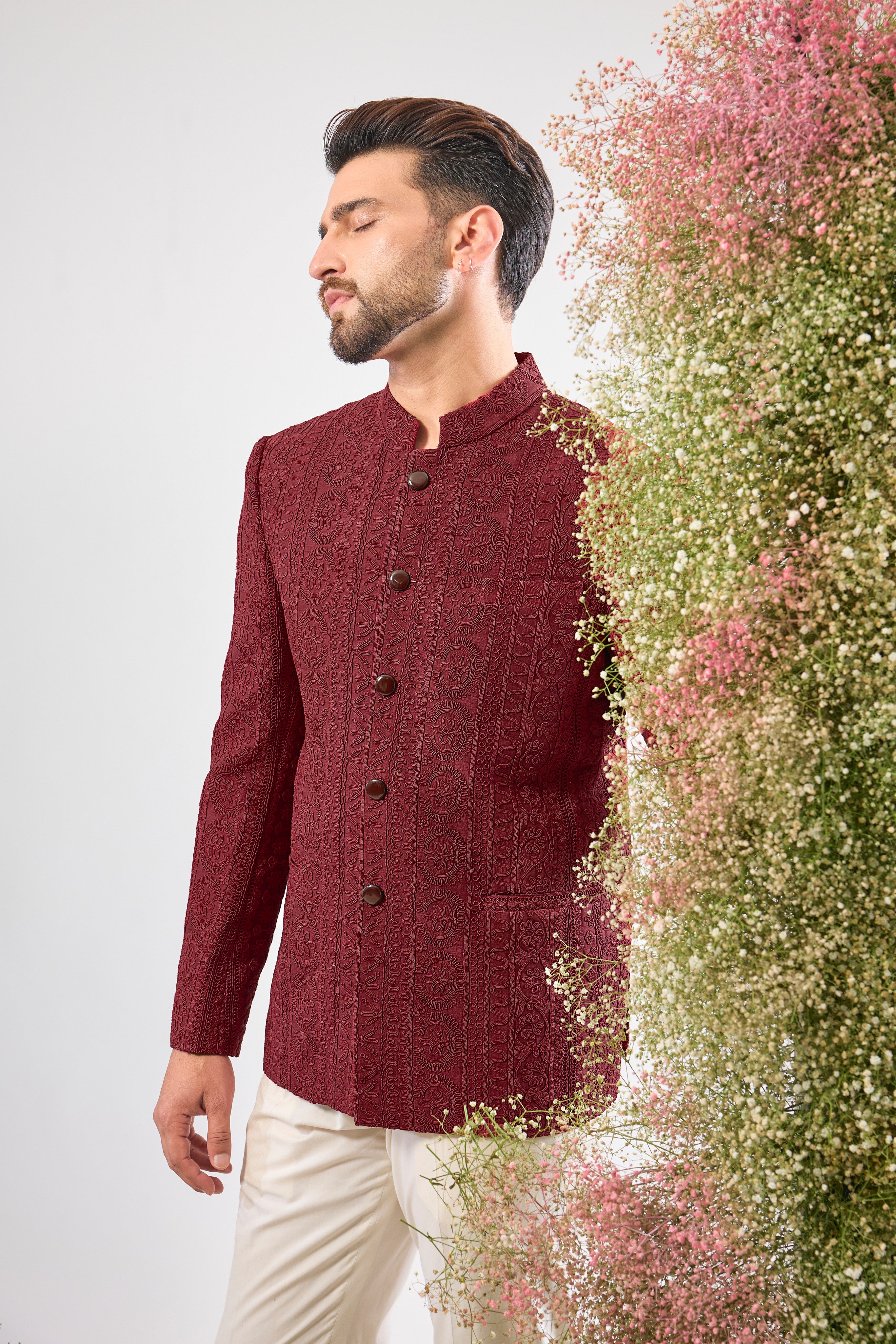 This Maroon Bandhgala is incredibly classy and subtle, showcasing spectacular Heavy Doori Work that creates luxurious, textural depth. Designed for a discerning eye, this outfit guarantees a super classy look without any bling