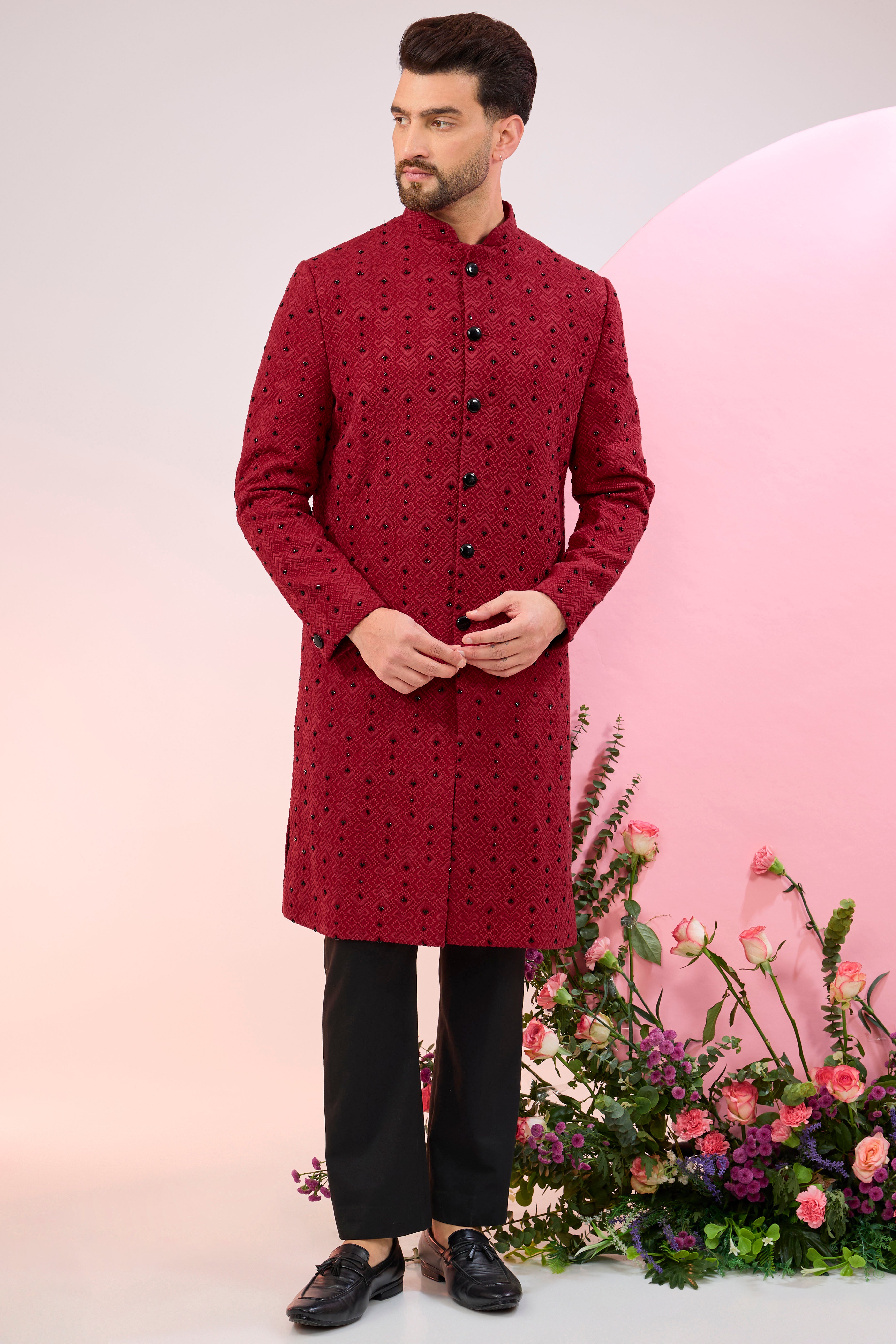 red geometrically embridred sherwani with black cutdana