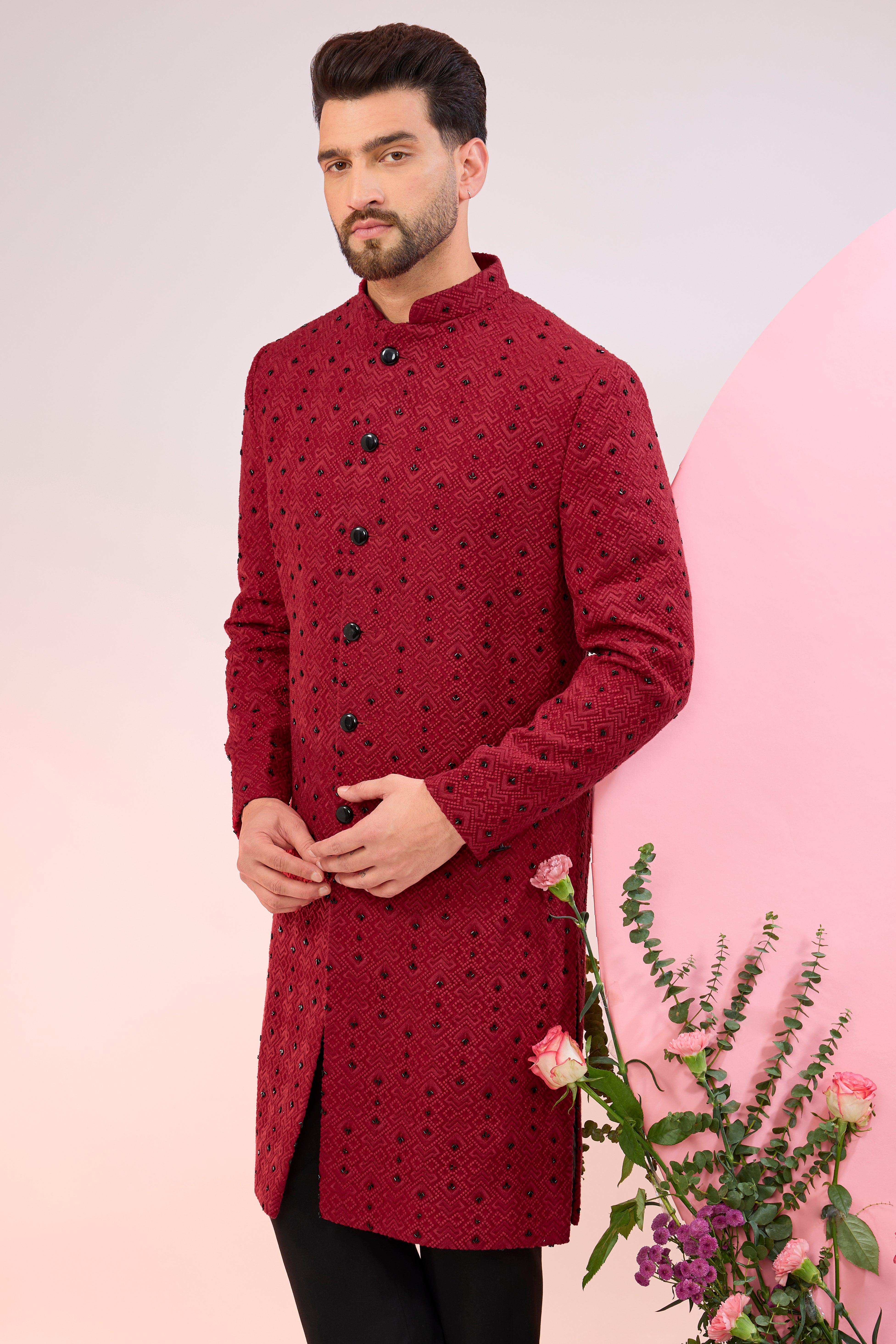 red geometrically embridred sherwani with black cutdana