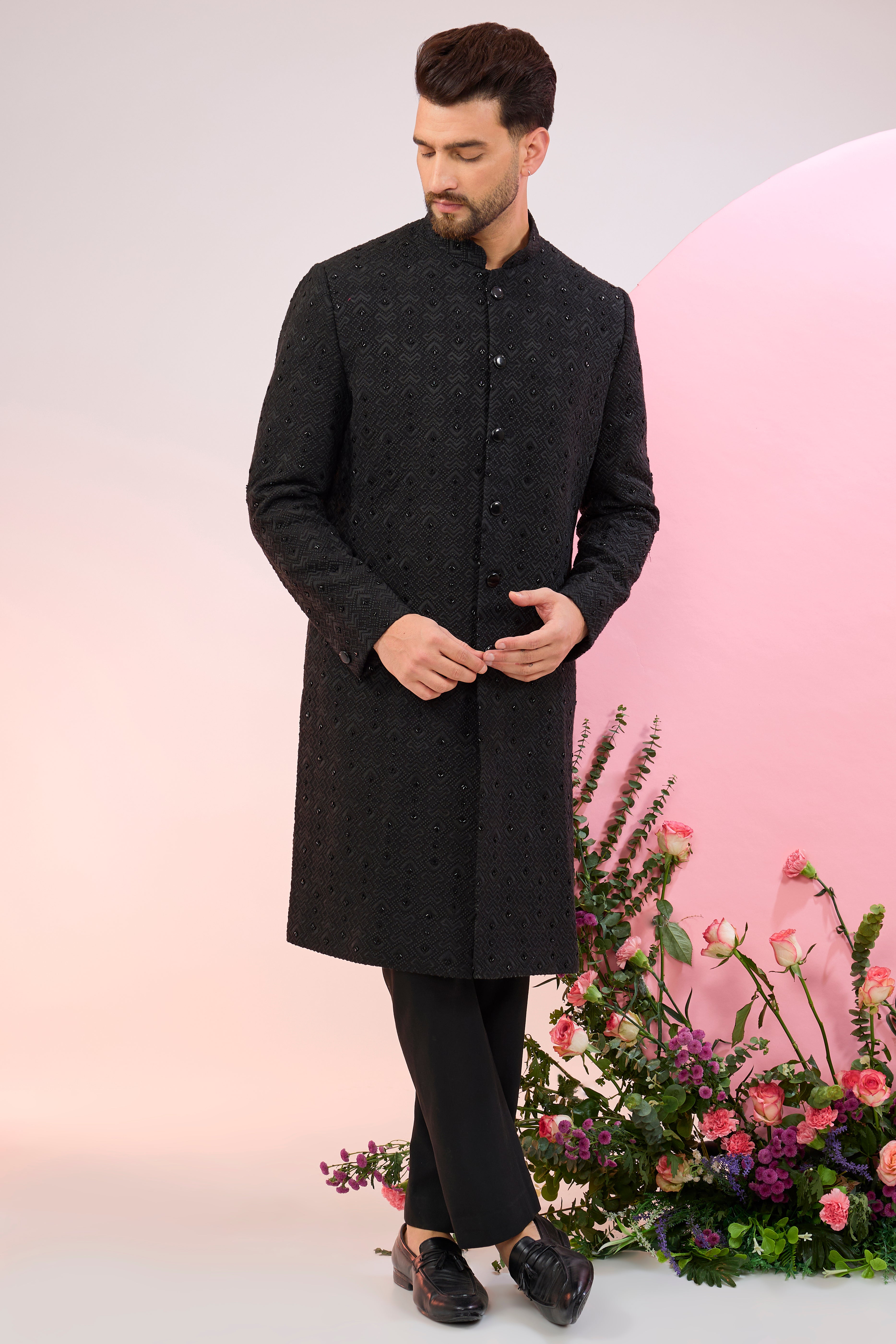 Black geometrically embroidered sherwani with delicate cut-dana work