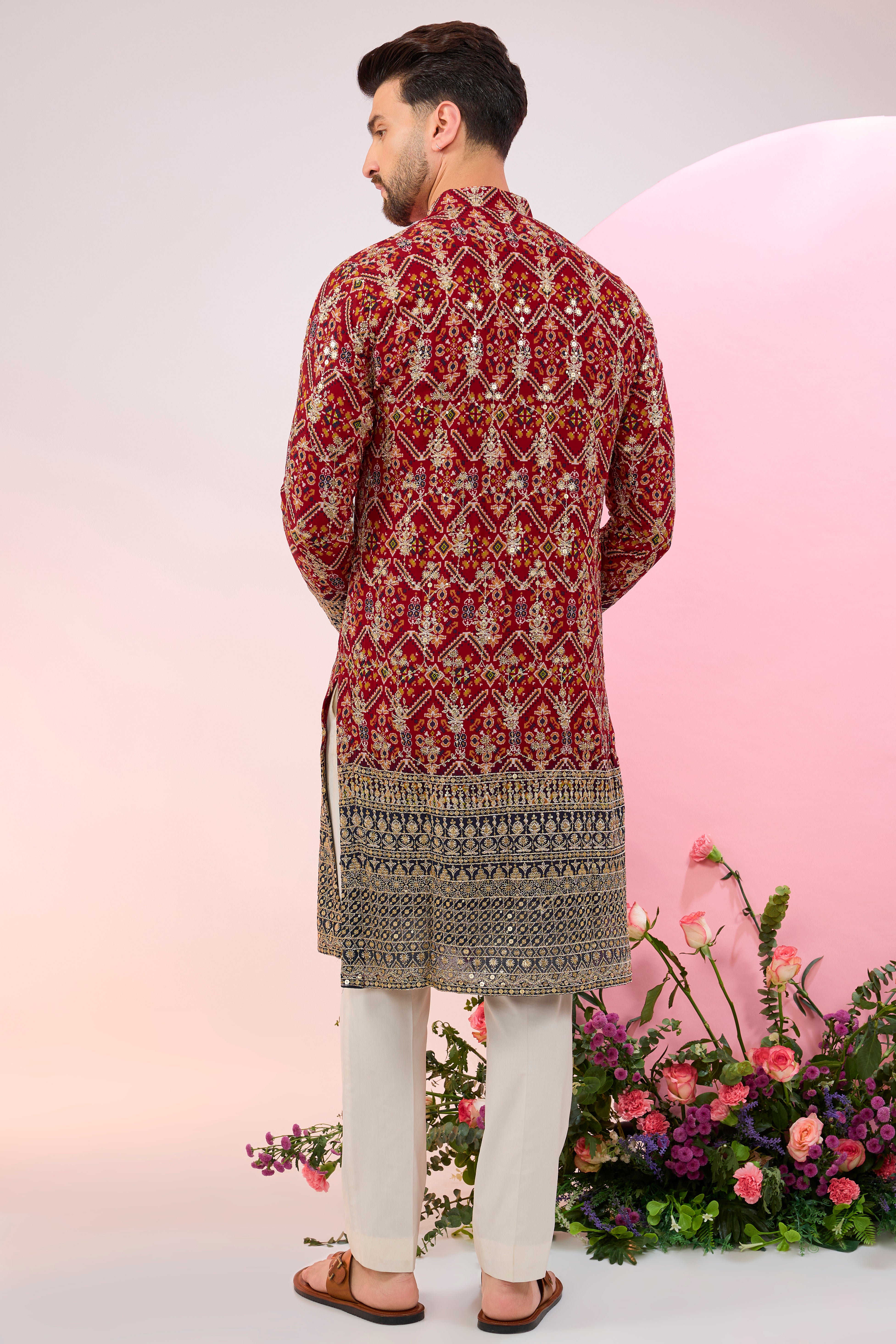 Red-multi colored bandhni kurta.