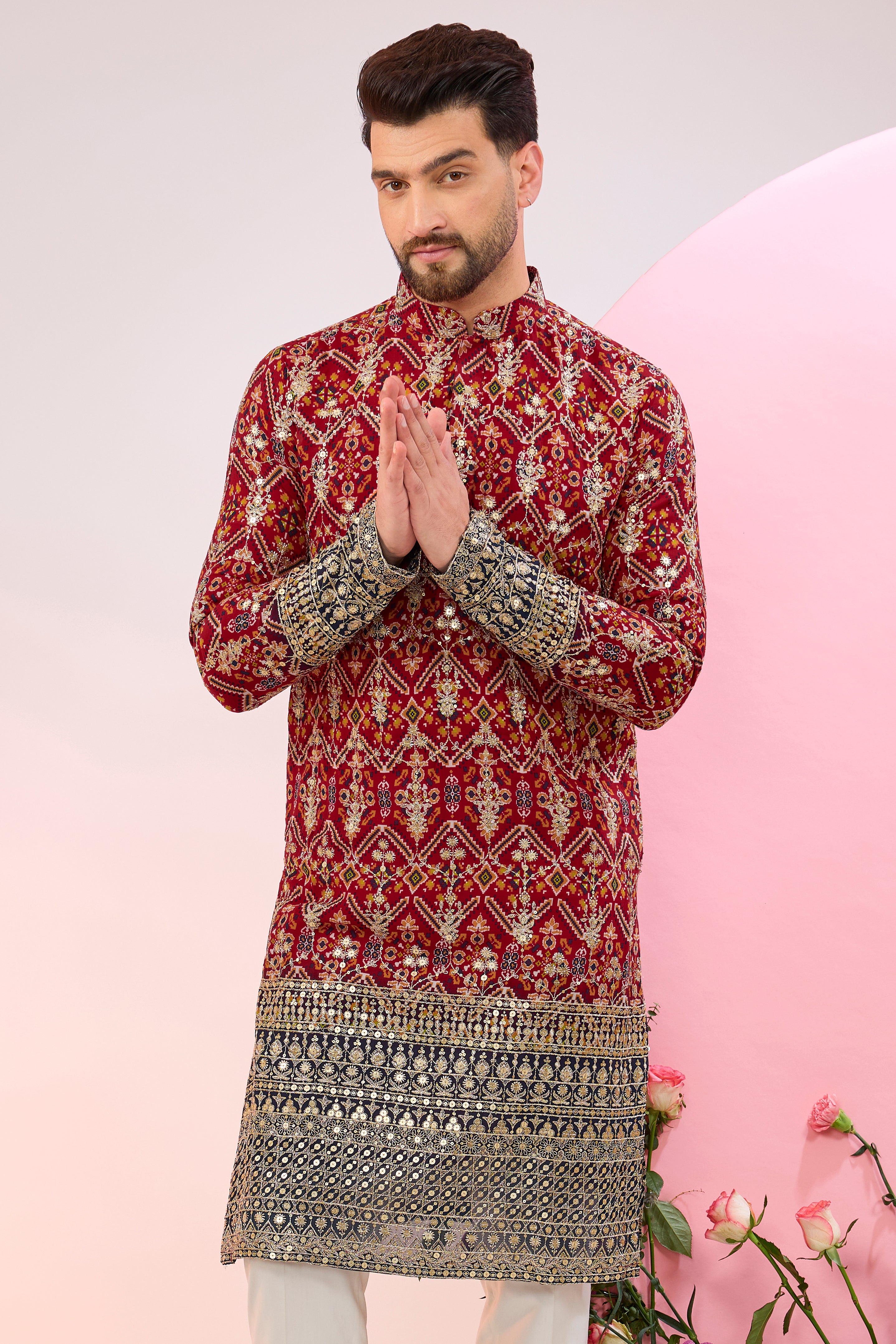 Red-multi colored bandhni kurta.