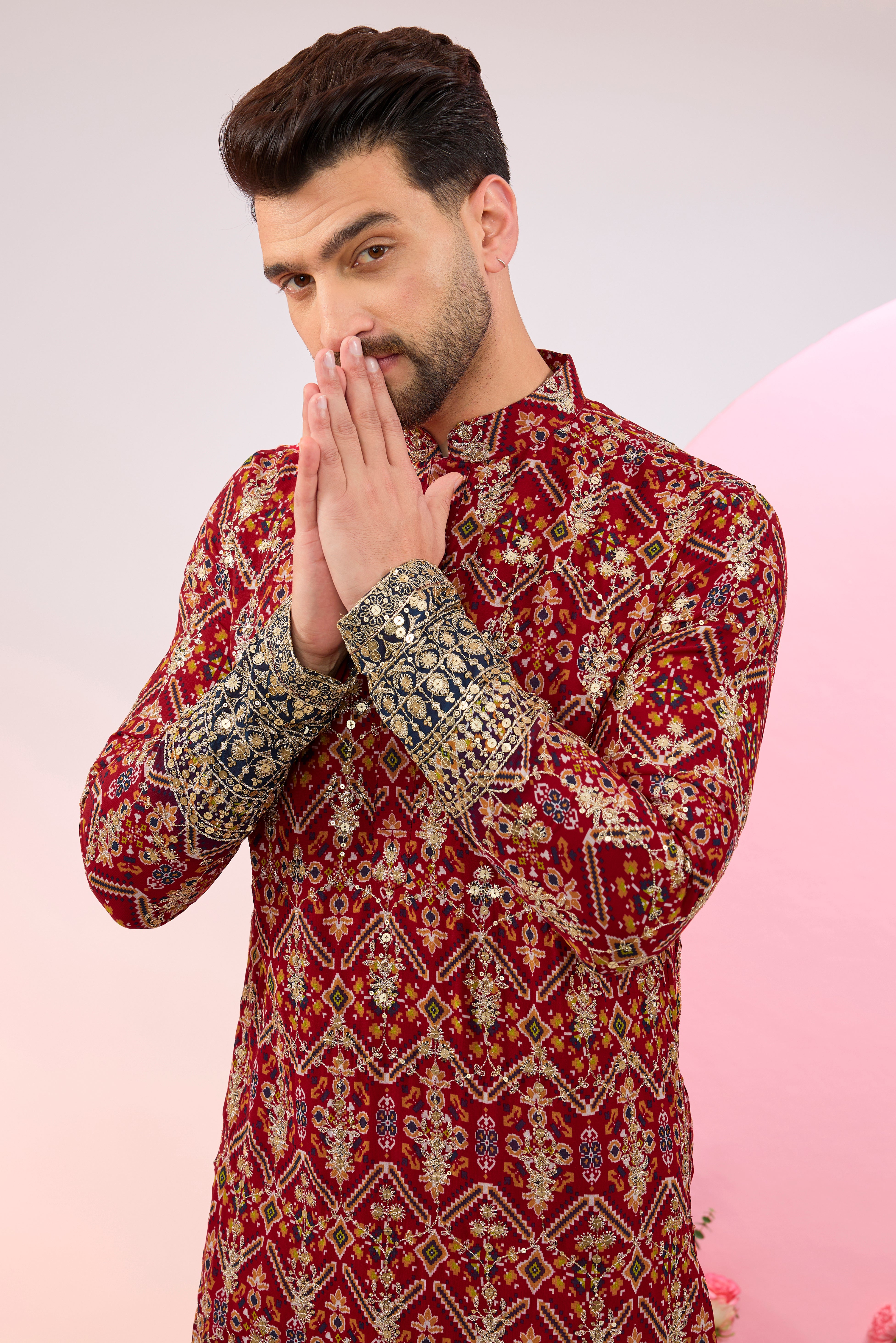 Red-multi colored bandhni kurta.