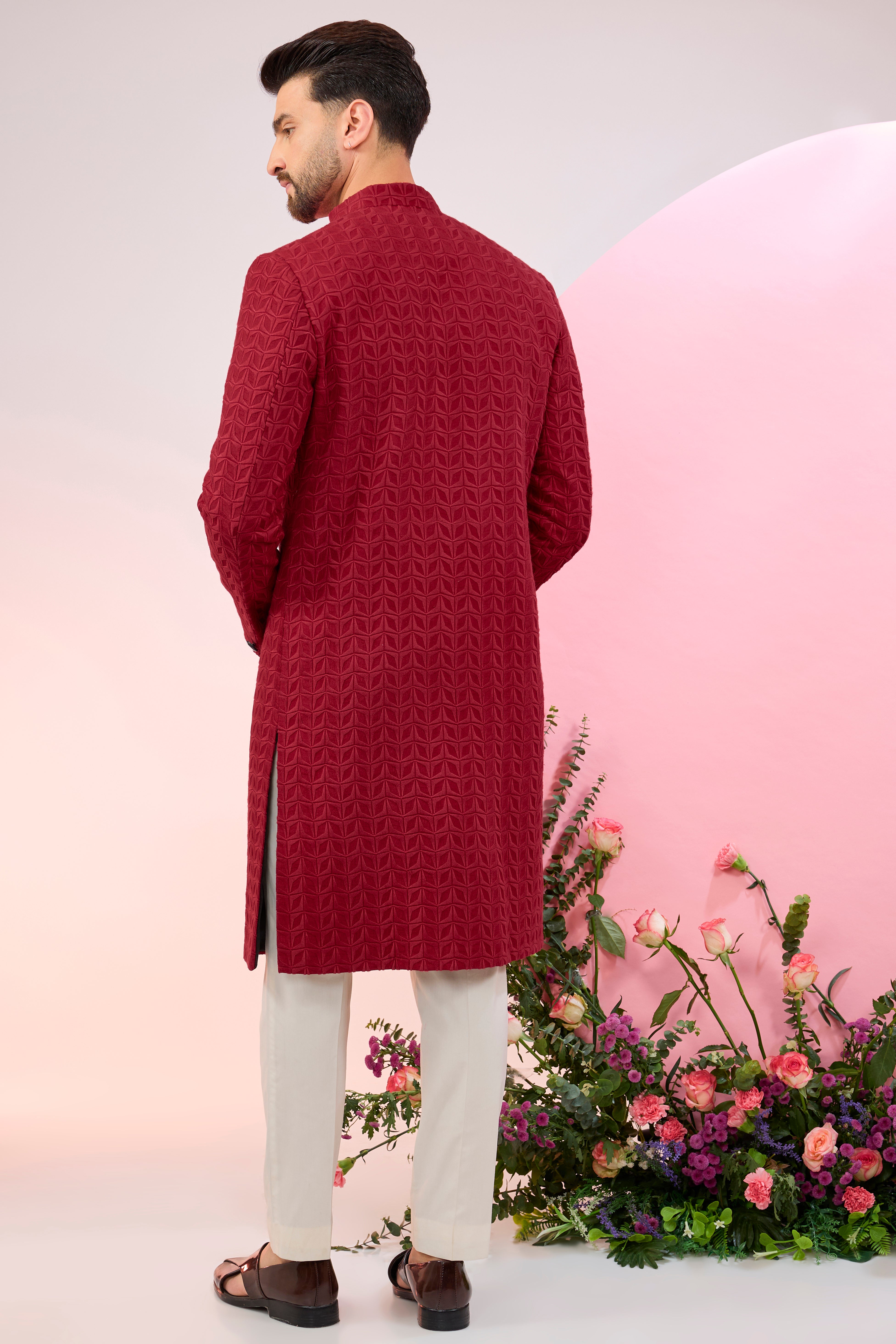 Red thread work sherwani.