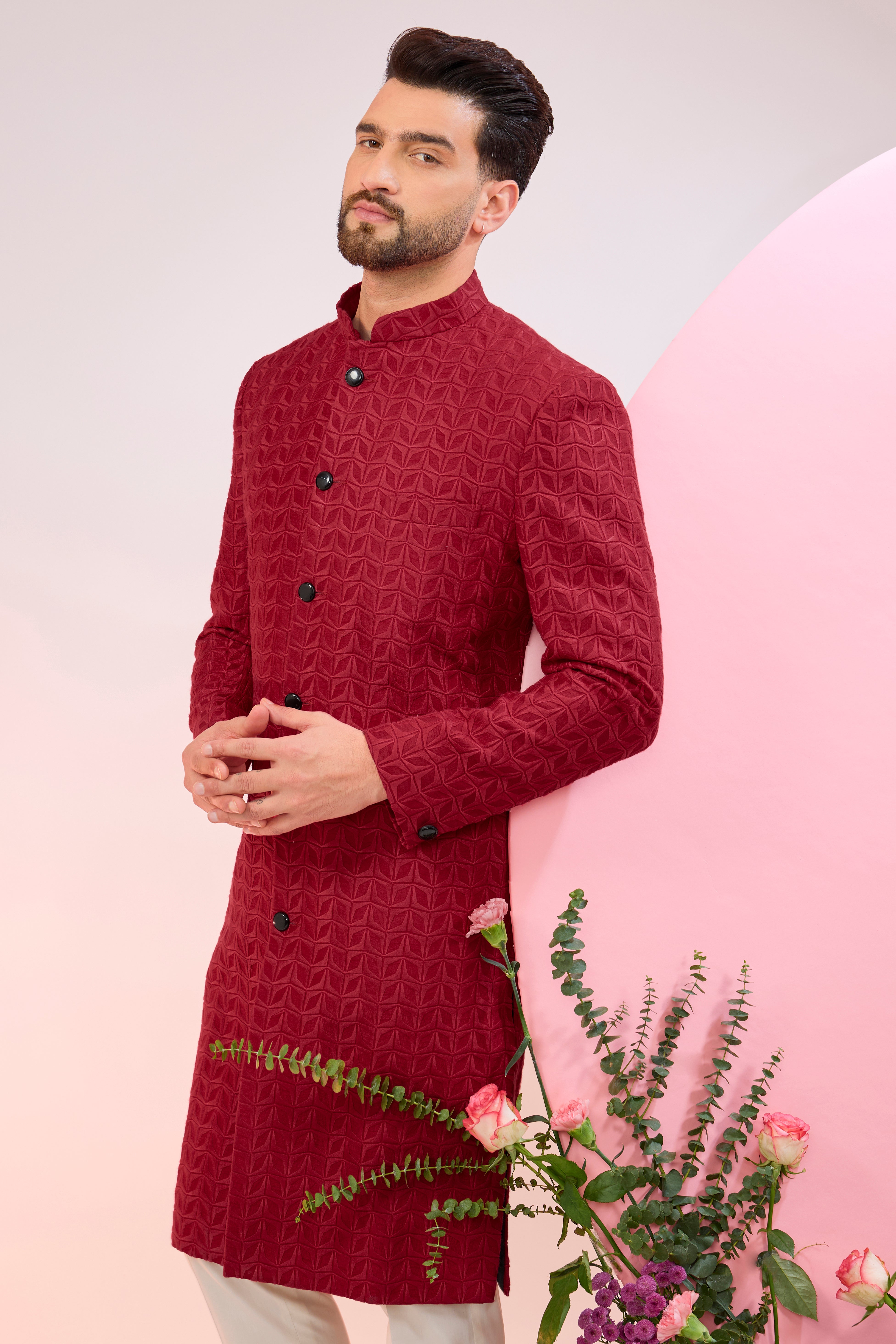 Red thread work sherwani.