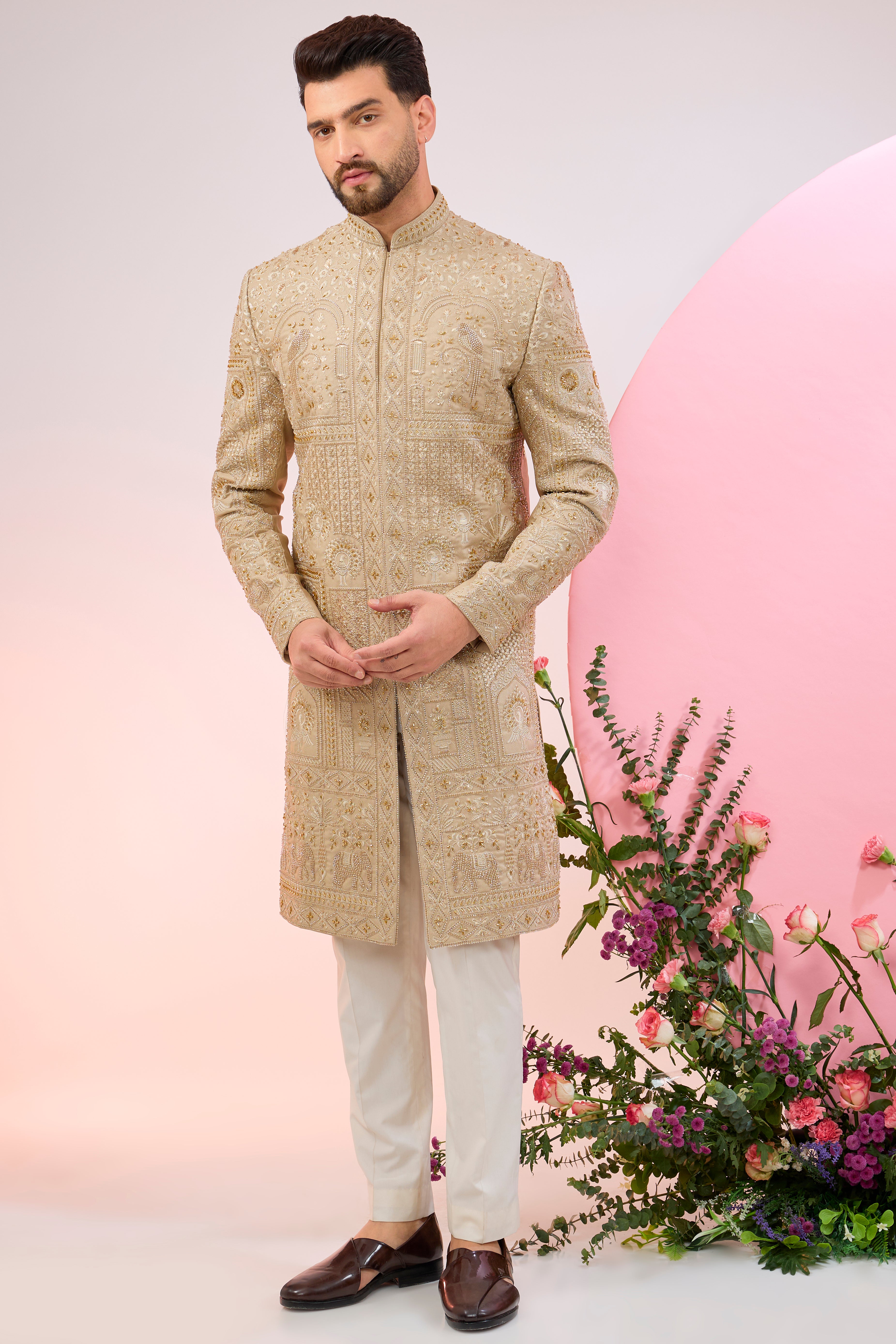 Beige hand embroidered sherwani with intricate thread and cut-dana embroidery