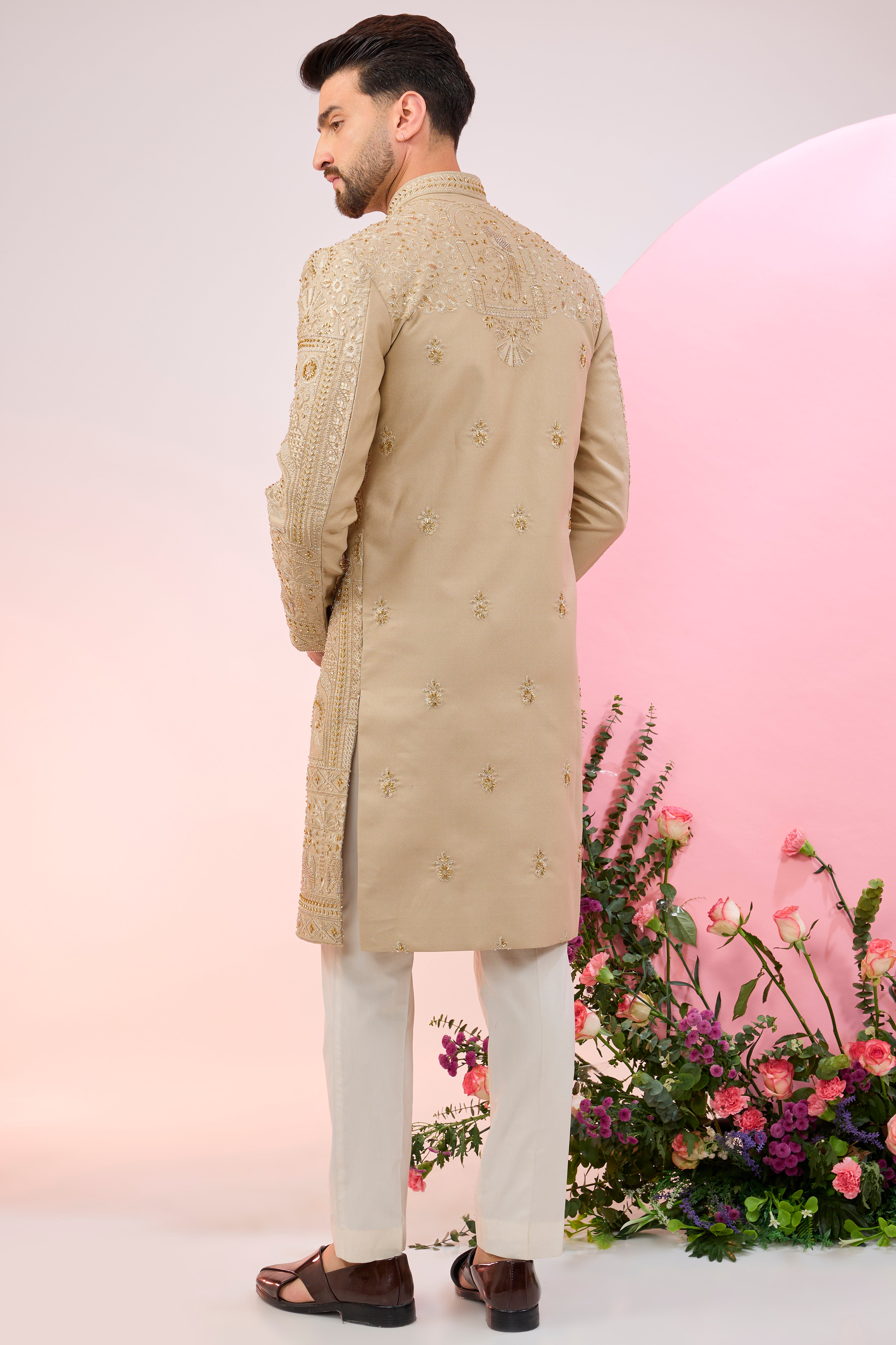 Beige hand embroidered sherwani with intricate thread and cut-dana embroidery