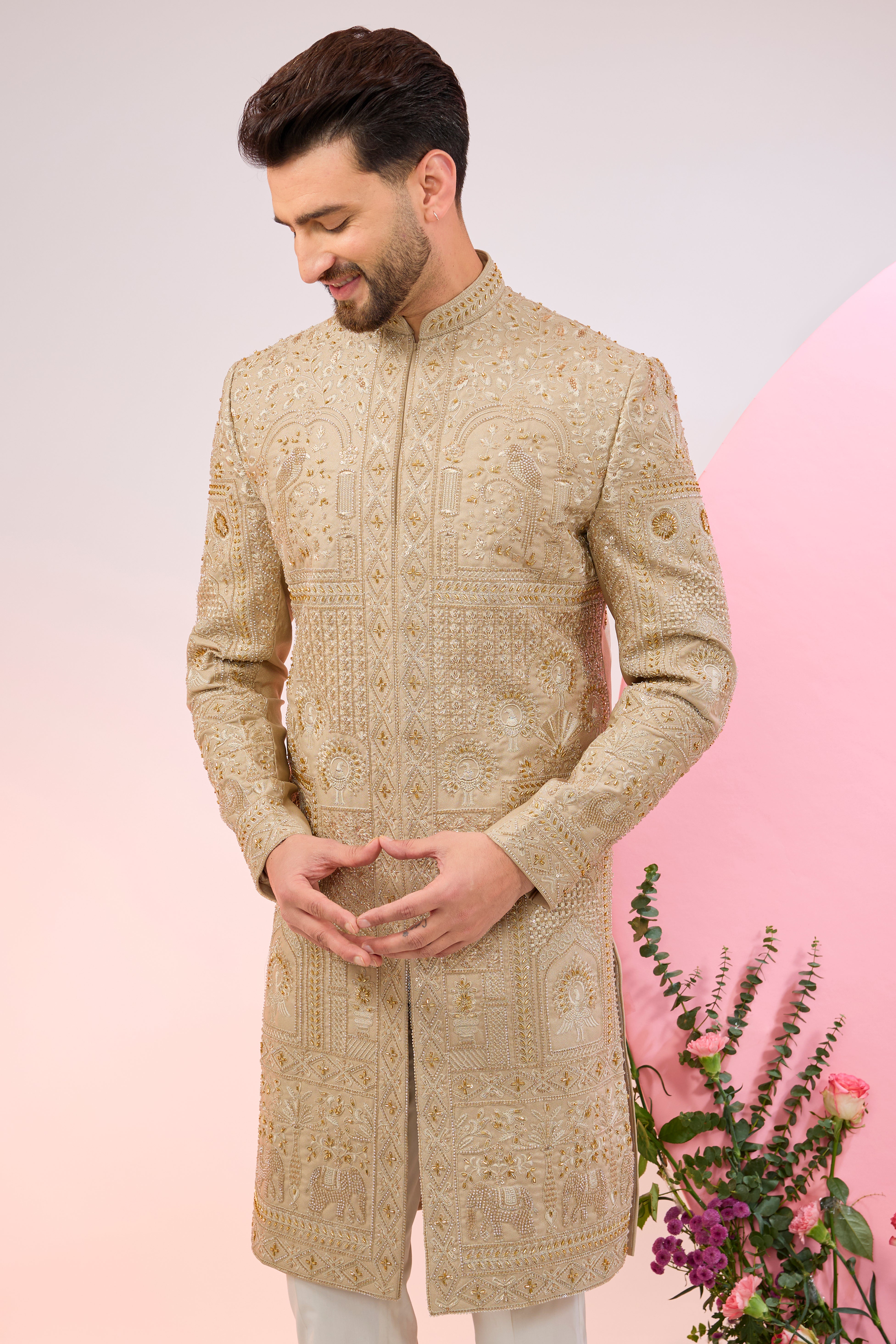 Beige hand embroidered sherwani with intricate thread and cut-dana embroidery