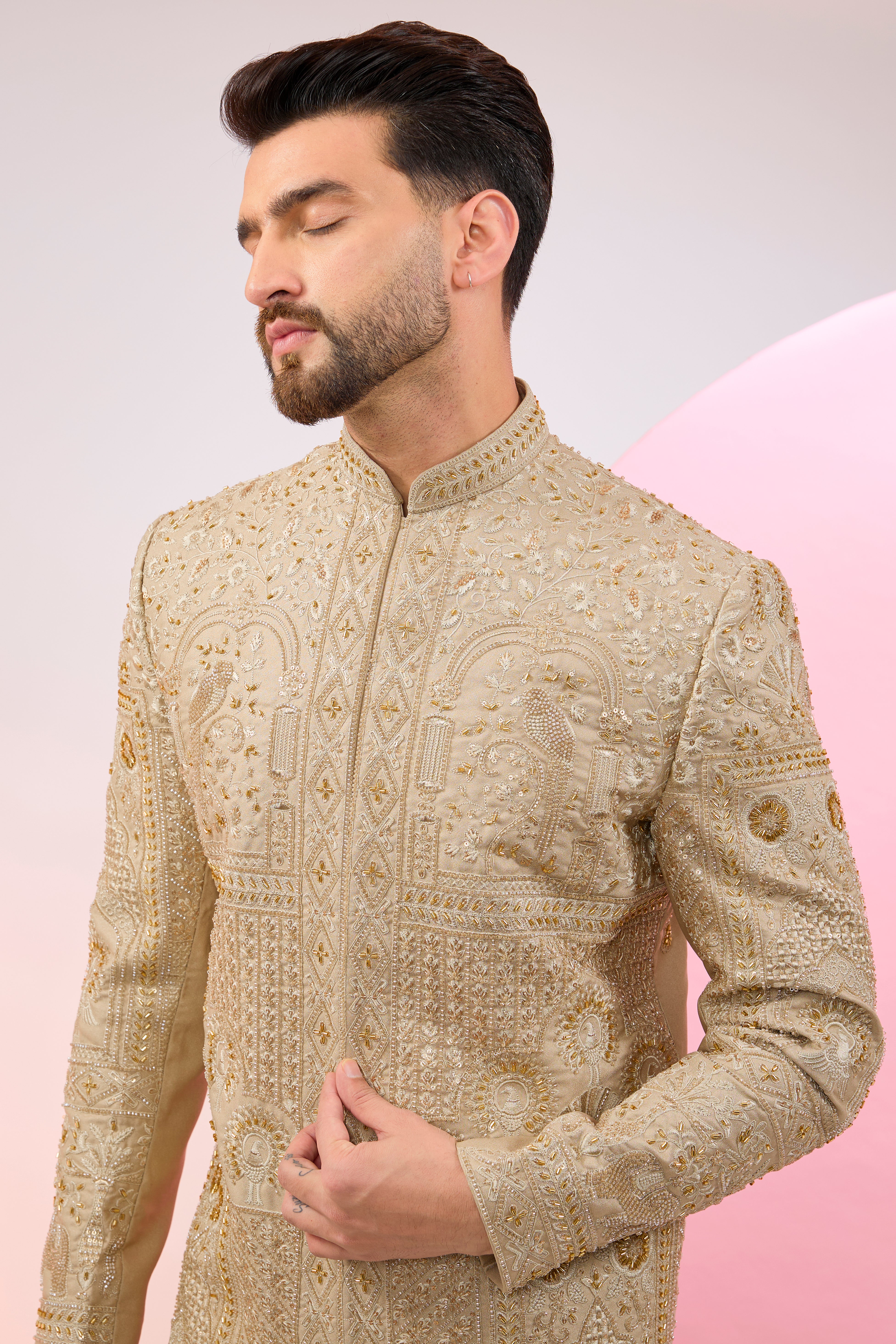 Beige hand embroidered sherwani with intricate thread and cut-dana embroidery