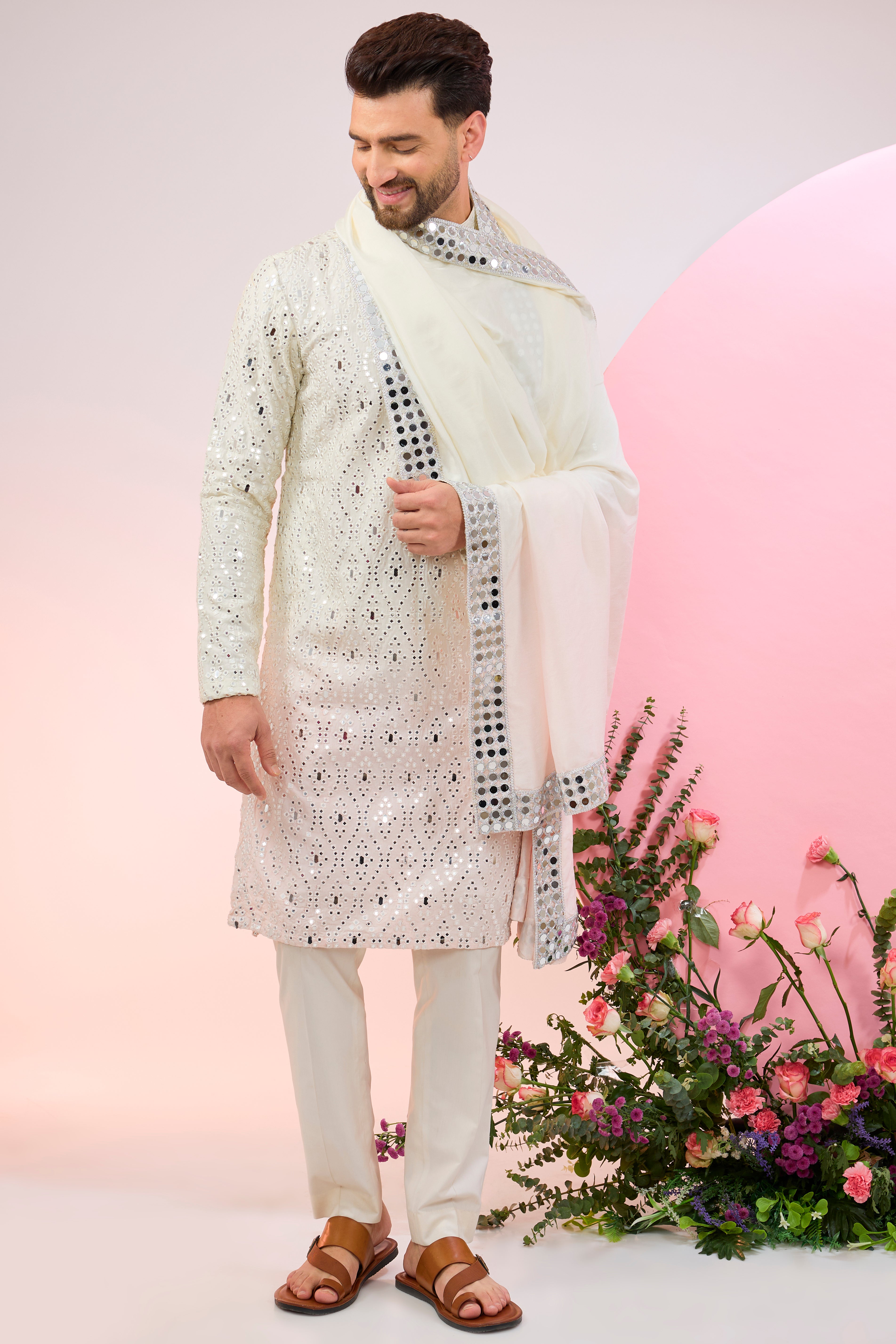 Signature ombre shaded mirror-work kurta paired with mirror-work stole.