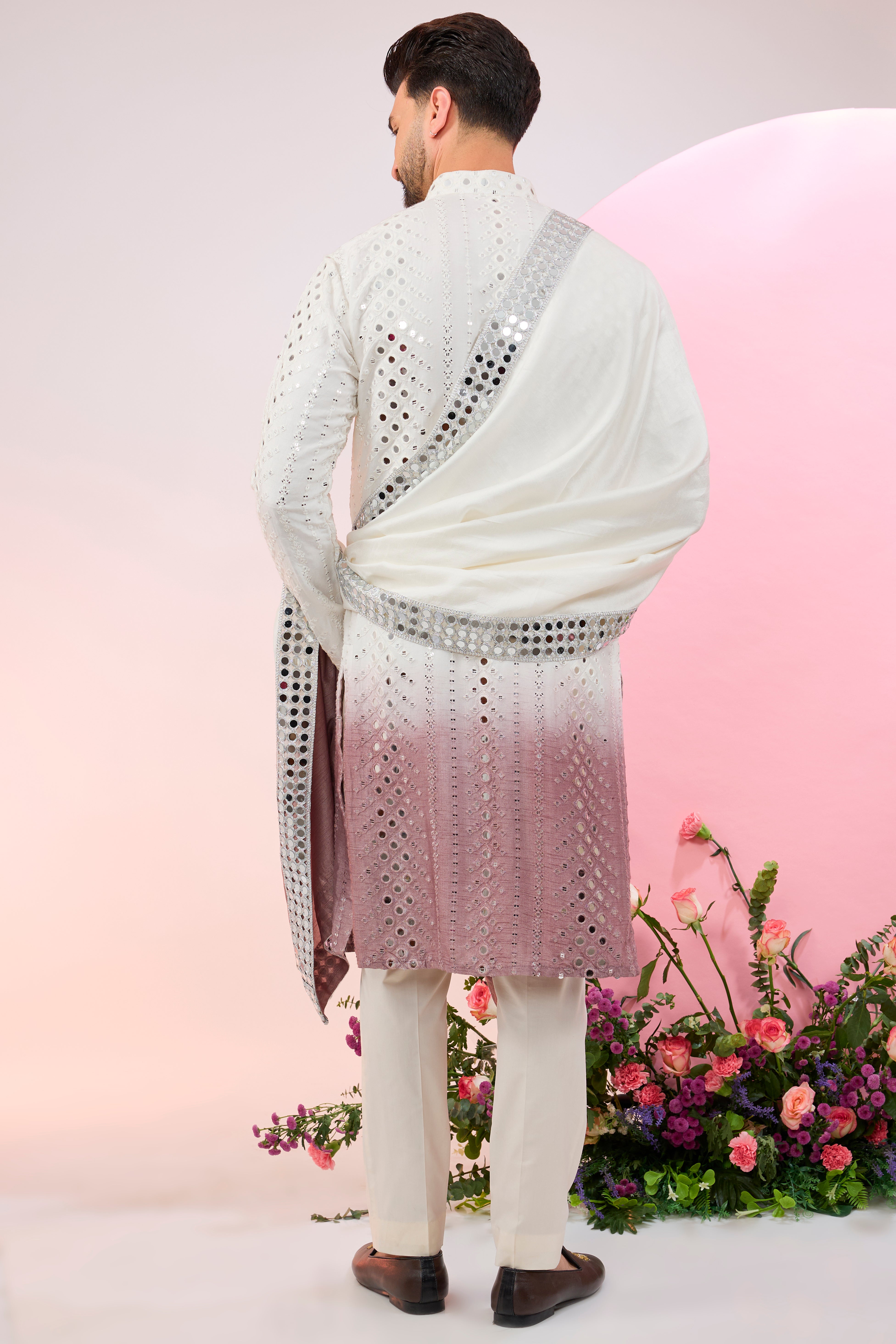 Signature ombre shaded mirror-work kurta paired with mirror-work stole.