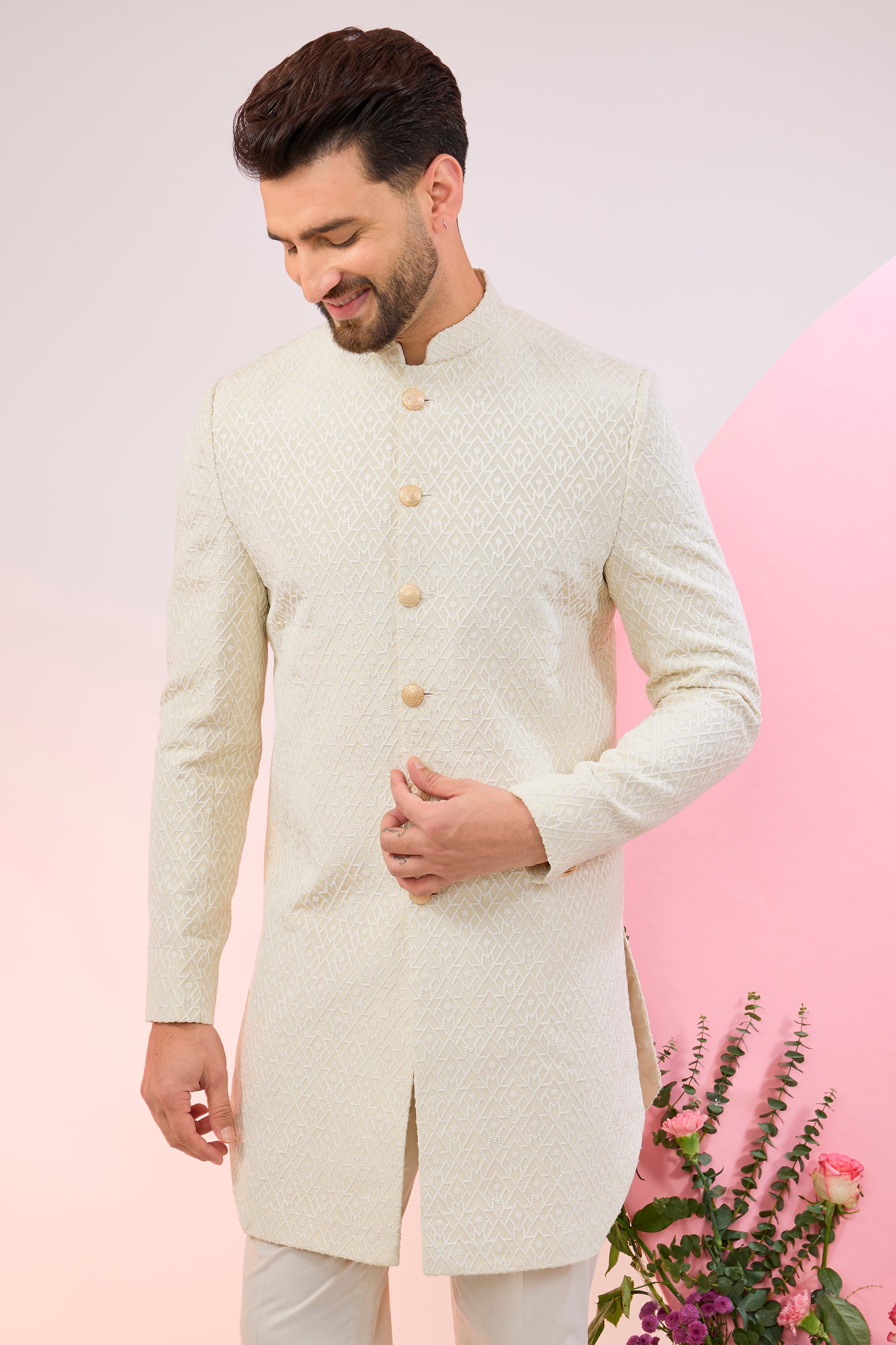 Cream geometrically embroidered royal cut indowestern.