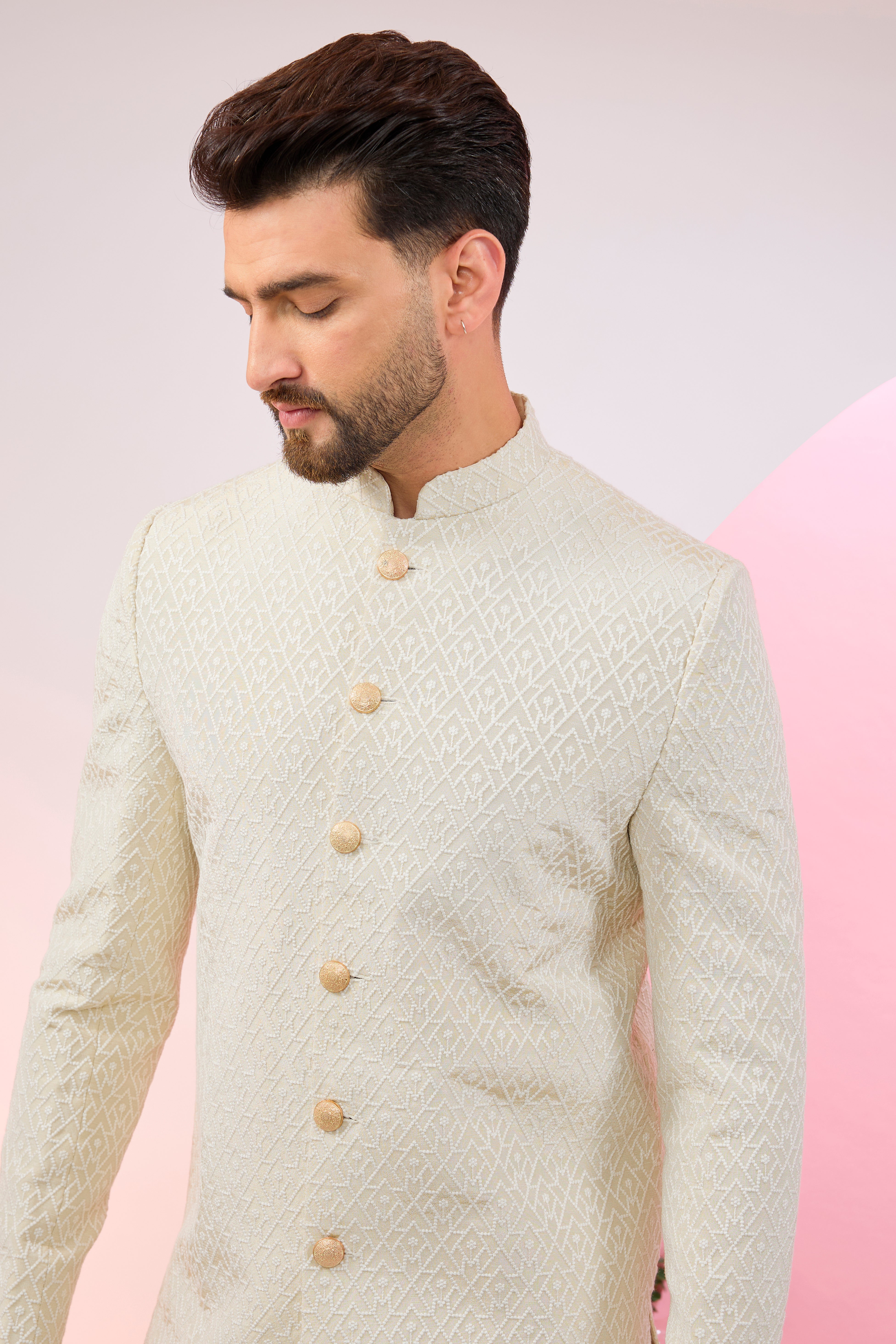 Cream geometrically embroidered royal cut indowestern.