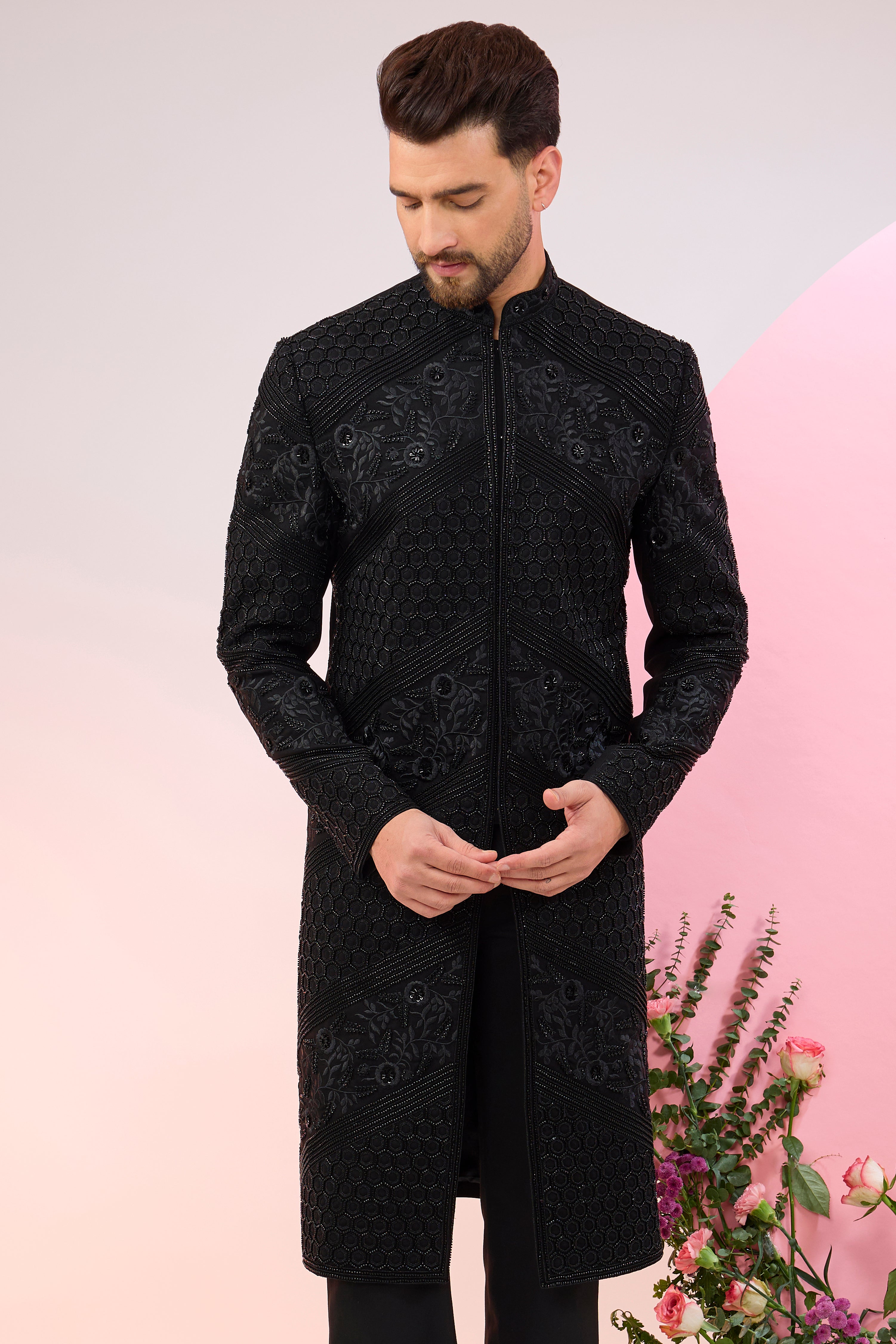 Black hand embroidered cut dana sherwani with intricate thread work.