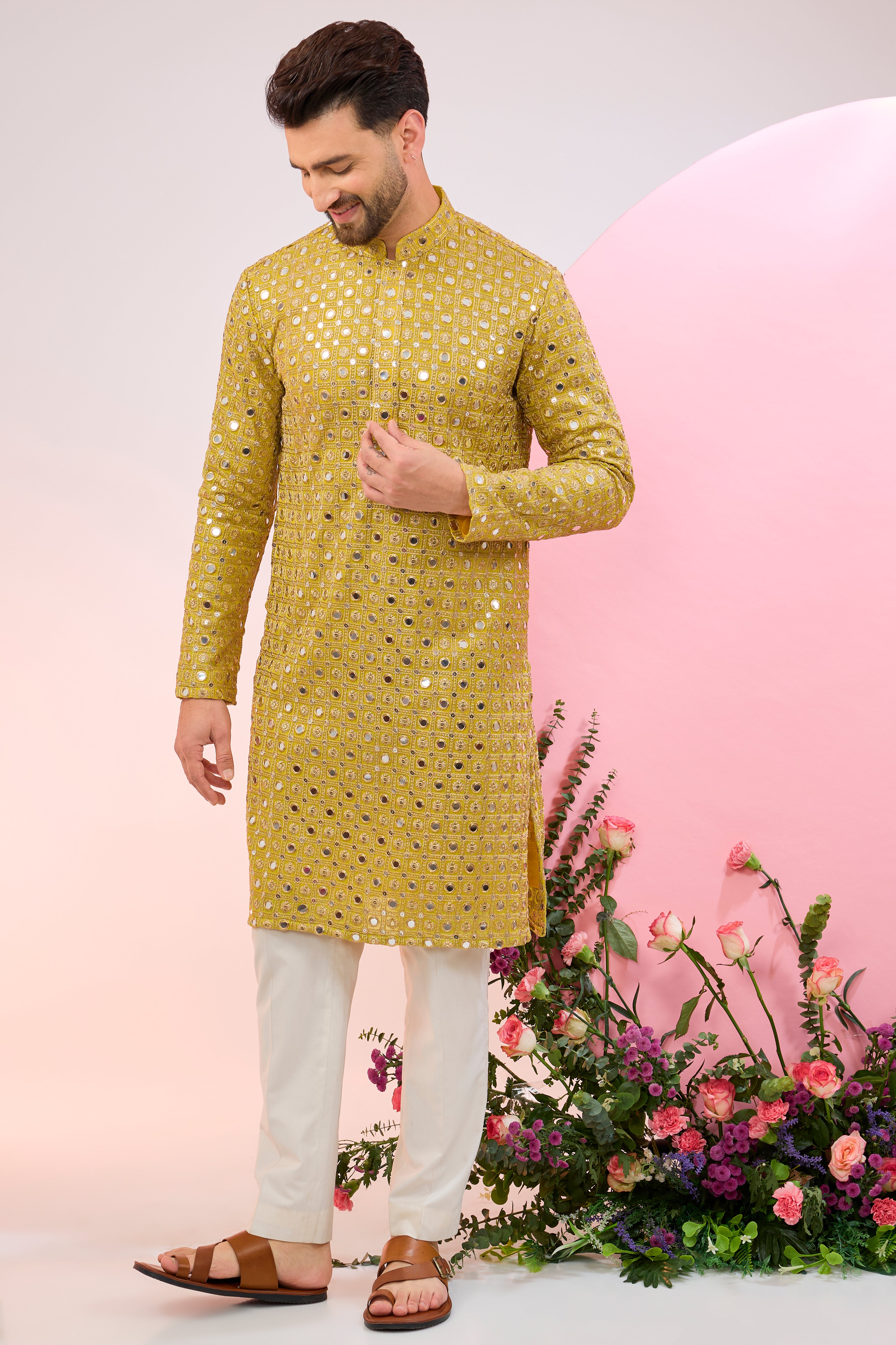 Neon yellow mirror work kurta with intricate zari embroidery.