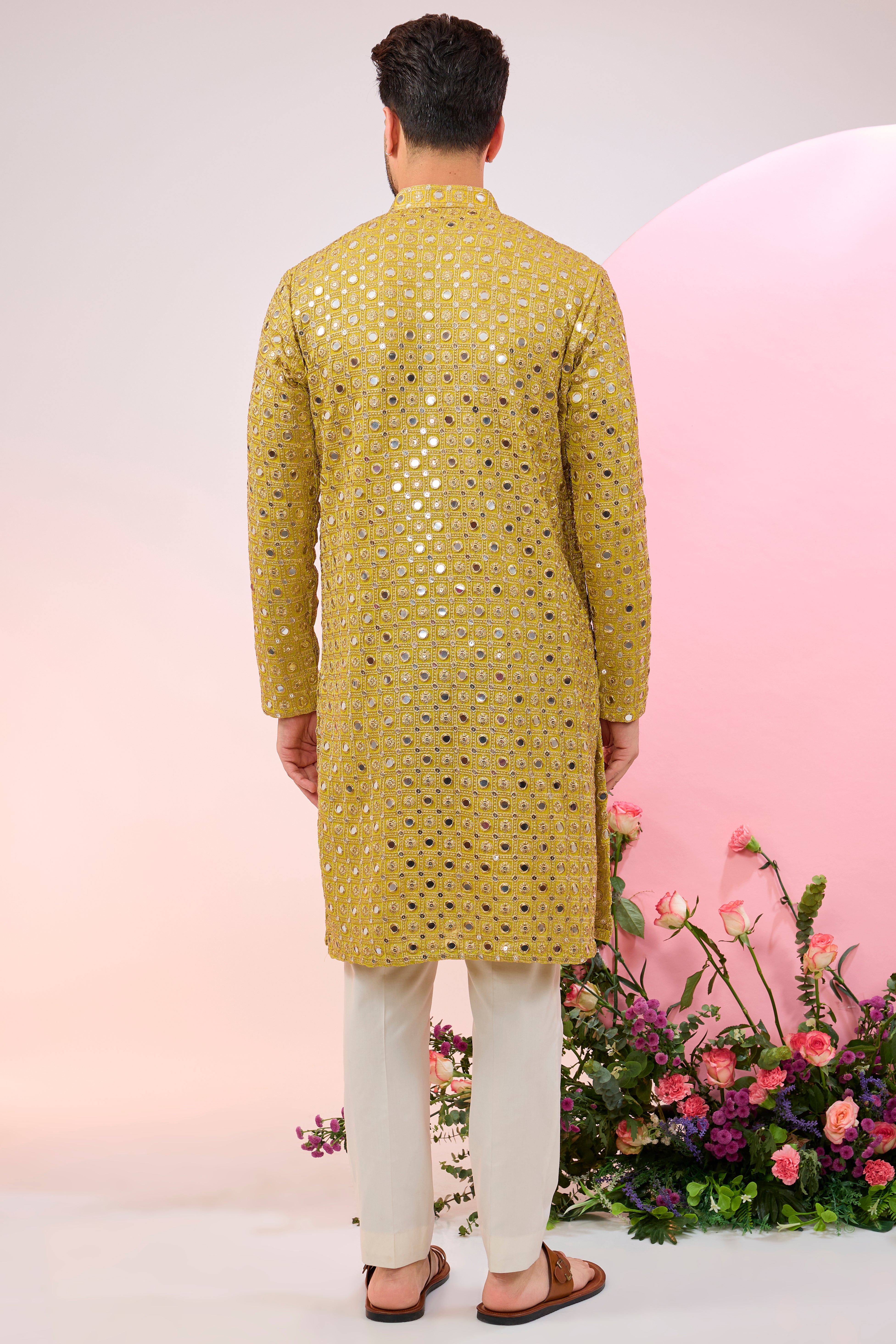 Neon yellow mirror work kurta with intricate zari embroidery.