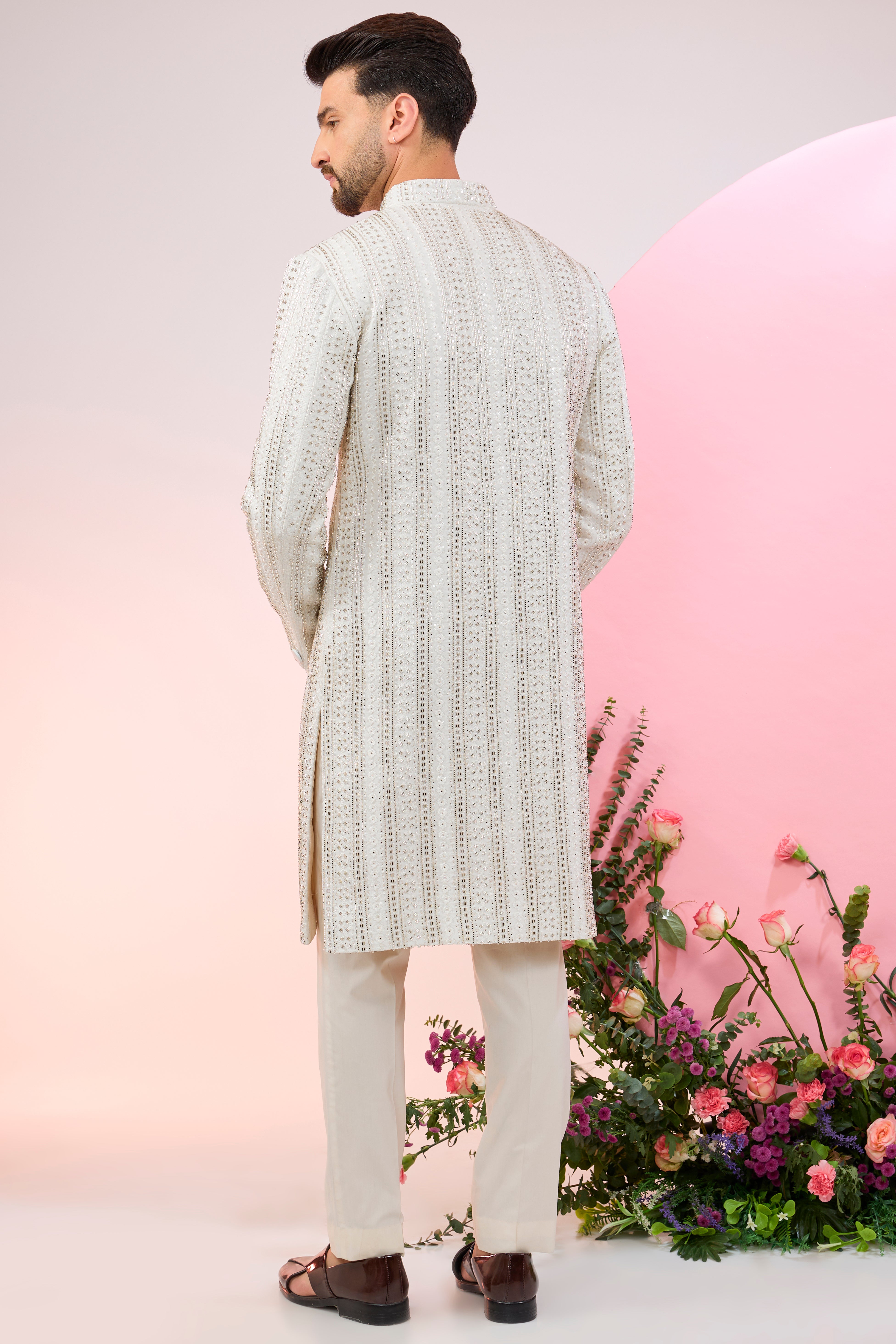 white sherwani with intricate cut dana embroidery