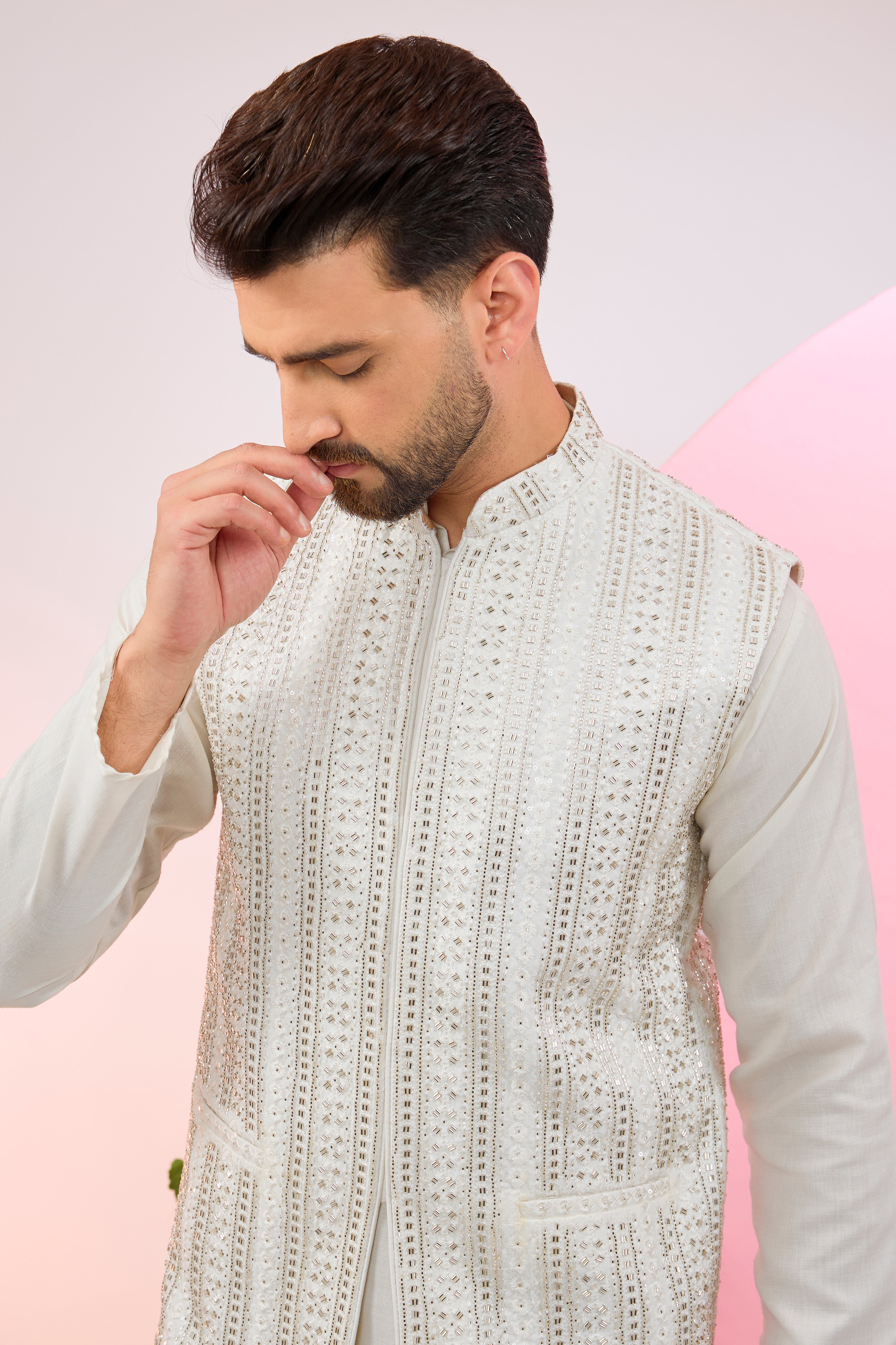 white nehru jacket with intricate cut dana embroidery