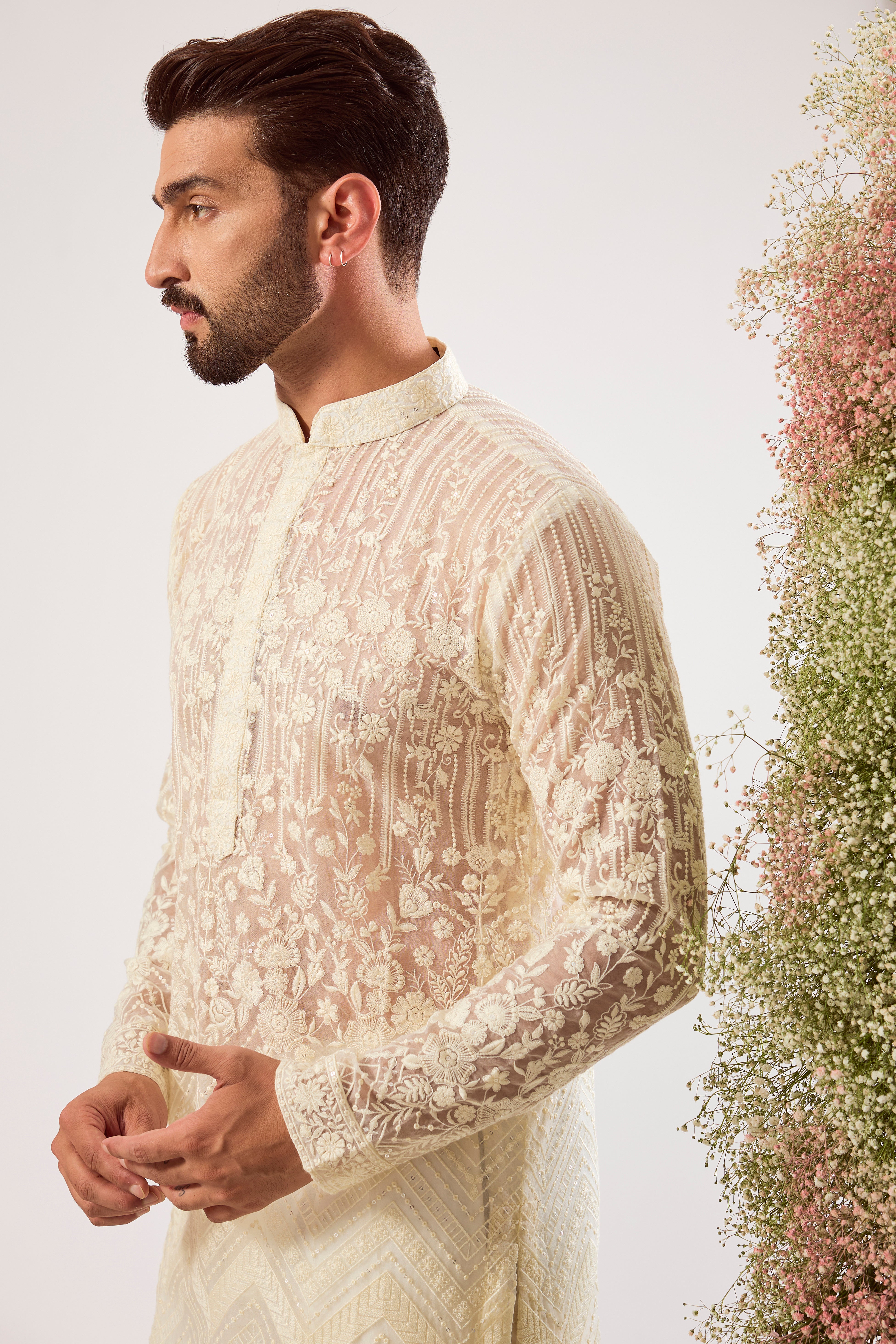 white see through chikankari kurta on organza with inricate floral embroidery and sequin work