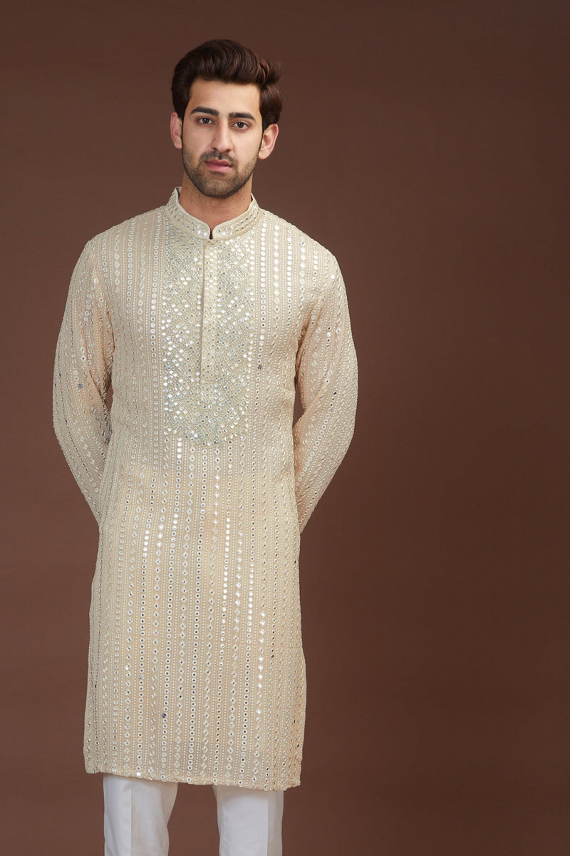 Beige hand embrodried mirror work kurtabeige hand embrodried mirror work kurta - kasbahmen