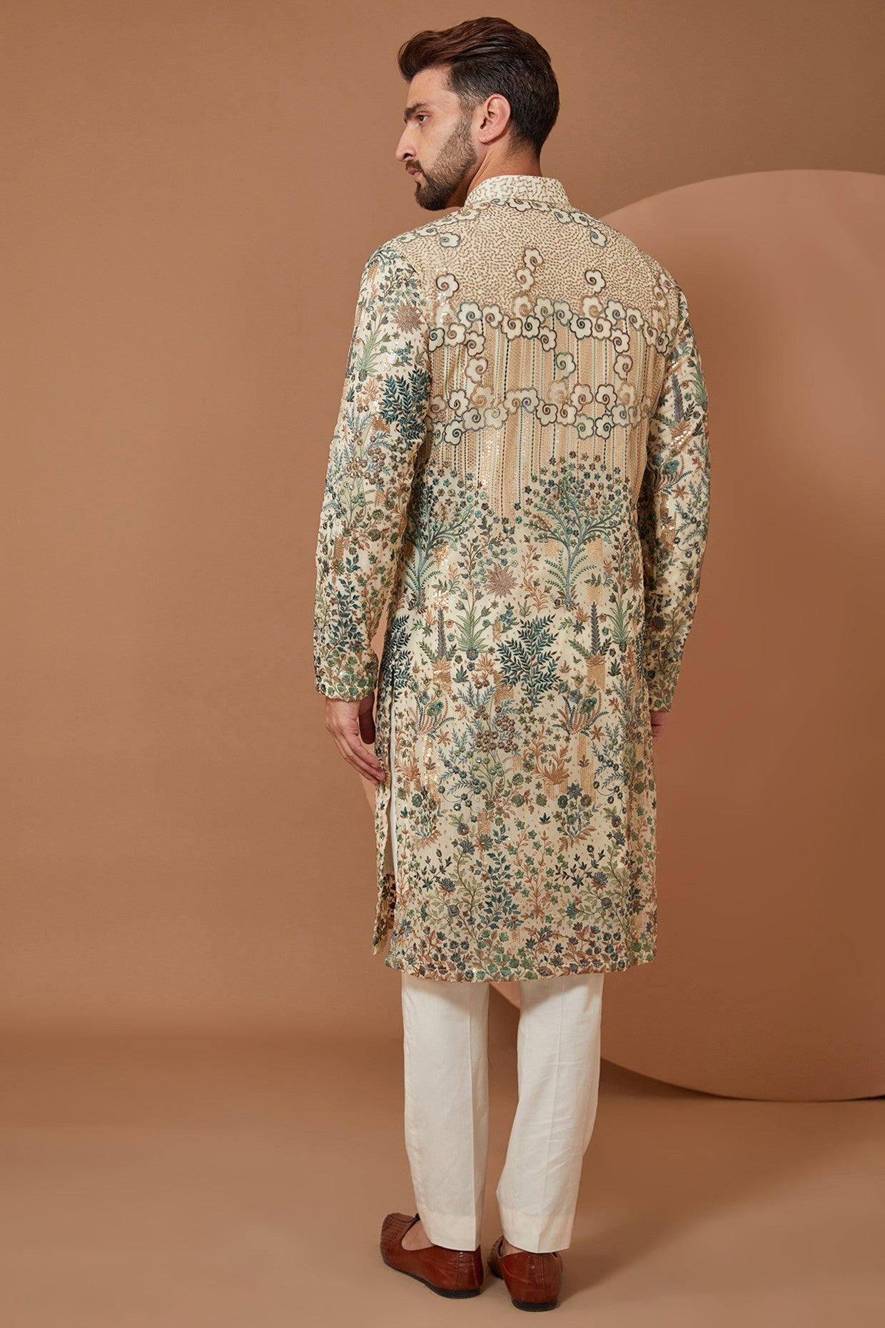 Intricately Crafted Ivory Floral Kurta with Green and Gold Threadwork - kasbahmen