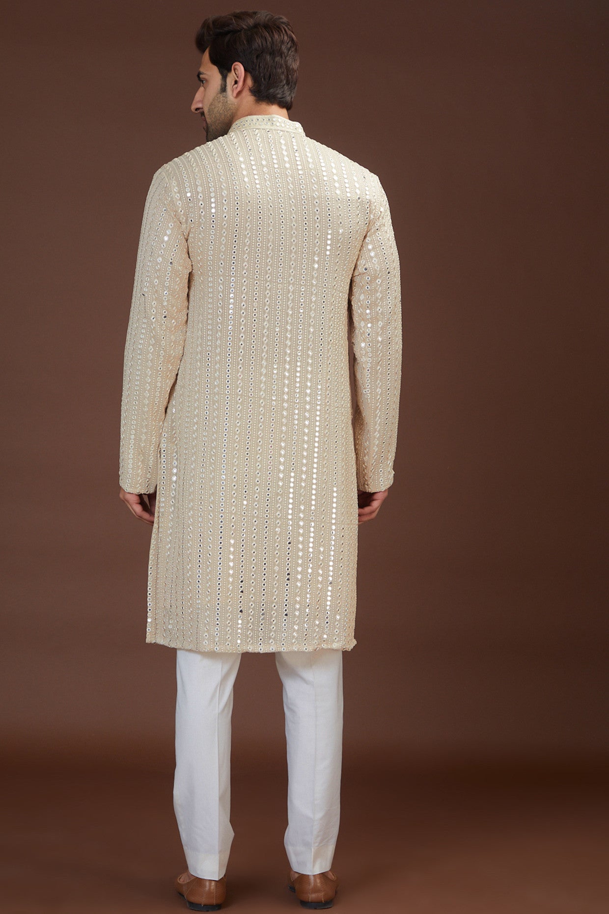 Beige hand embrodried mirror work kurtabeige hand embrodried mirror work kurta - kasbahmen